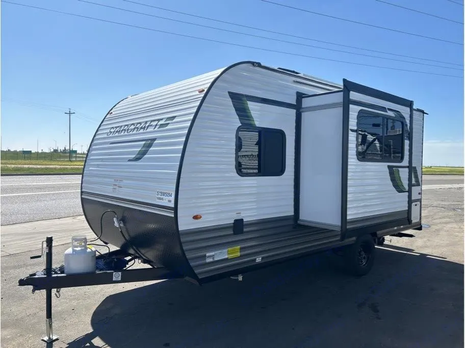 White StarCraft travel trailer, ideal for rv rental adventures. Features a black lower body, propane tank, and an open side entry.. Starcraft Autumn Ridge 2025