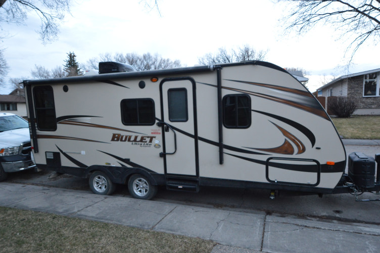 motorhomes for rent calgary | fully equipped trailer with a queen-size bed