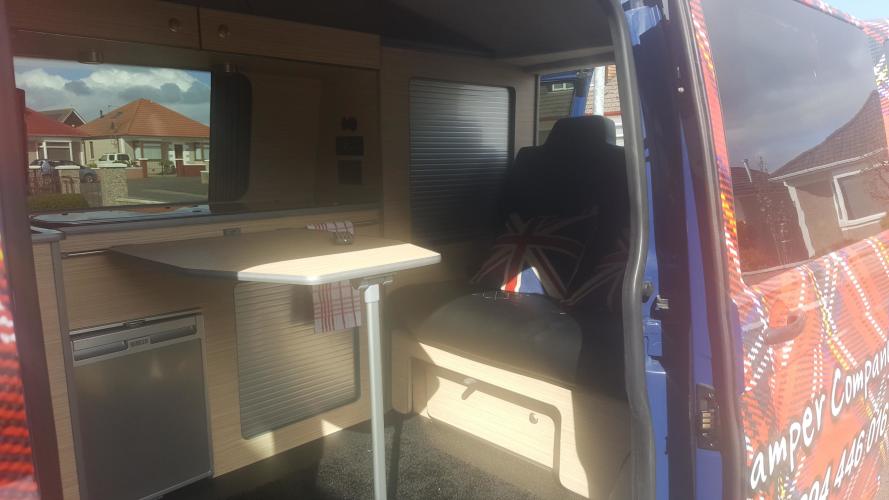 well-equipped campervan with double bed