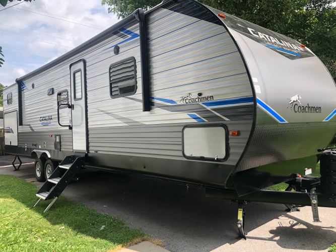 roomy camper with a large electric awning