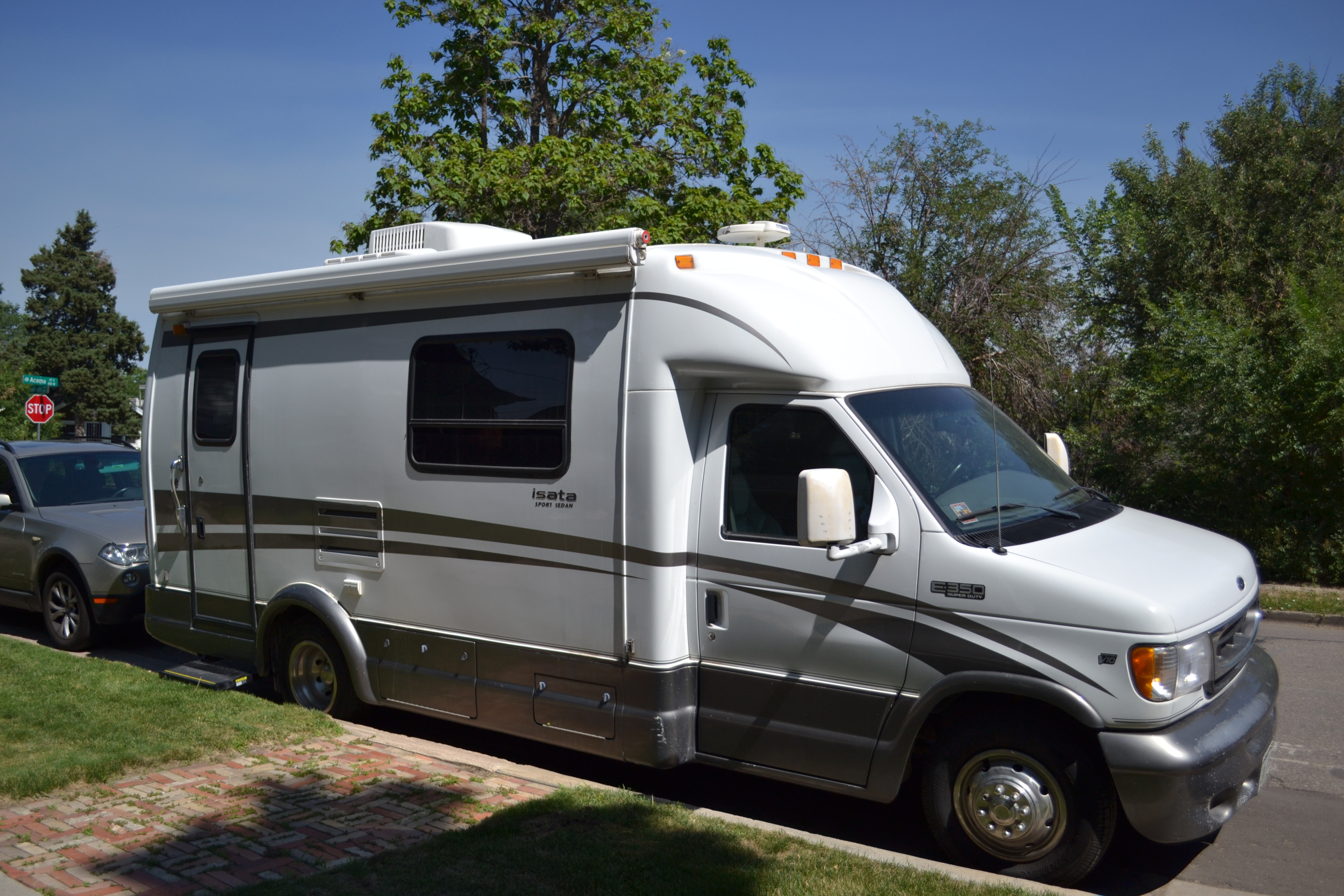 2001 Dynamax Corp Isata Camper van Rental in Englewood, CO | Outdoorsy