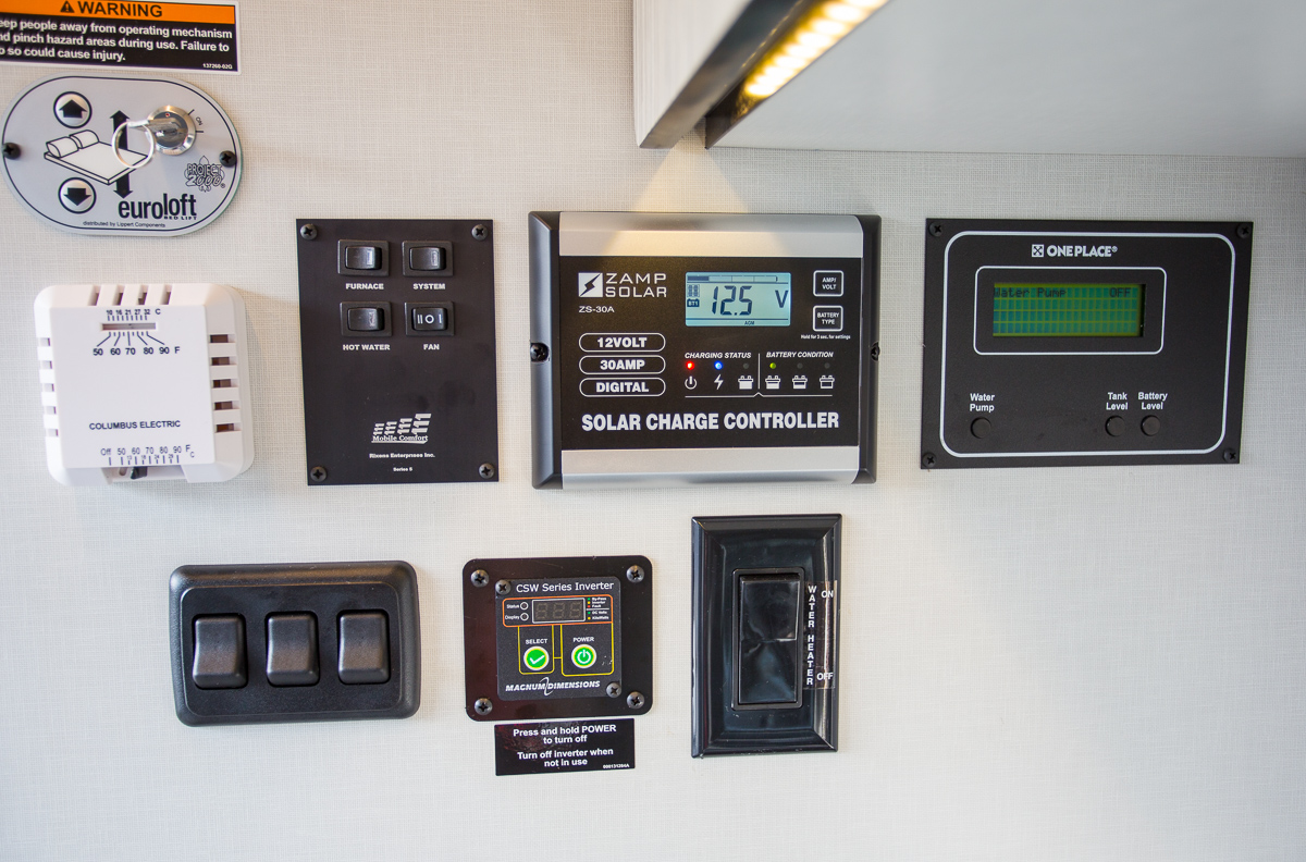 RV rental control panel: solar, battery, water, heating, bed lift, & inverter settings for on-the-road comfort.. Winnebago Other 2018
