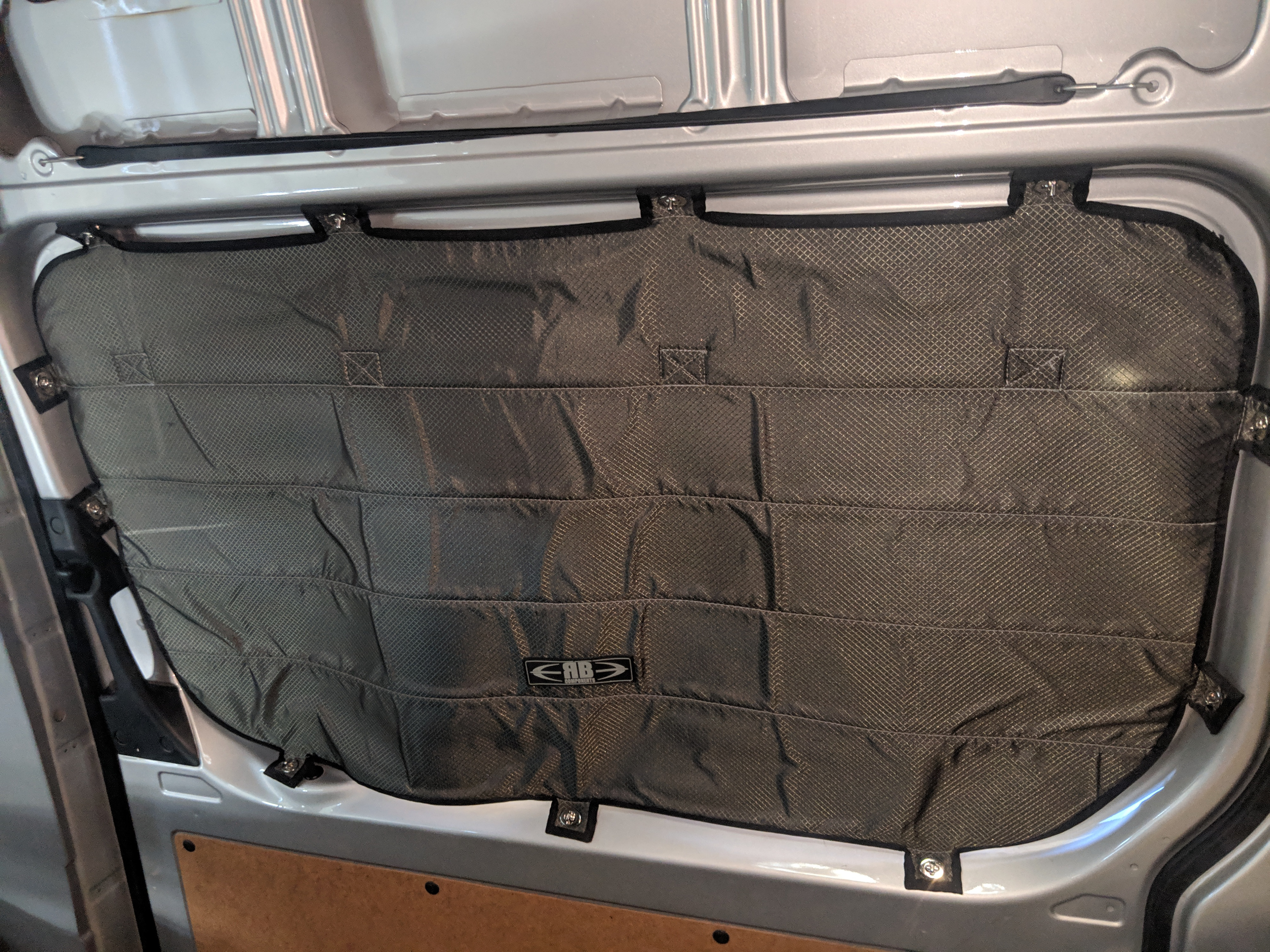 Quilted insulation panel for an RV rental van window, providing privacy and temperature control.. Mercedes-Benz Sprinter 2016