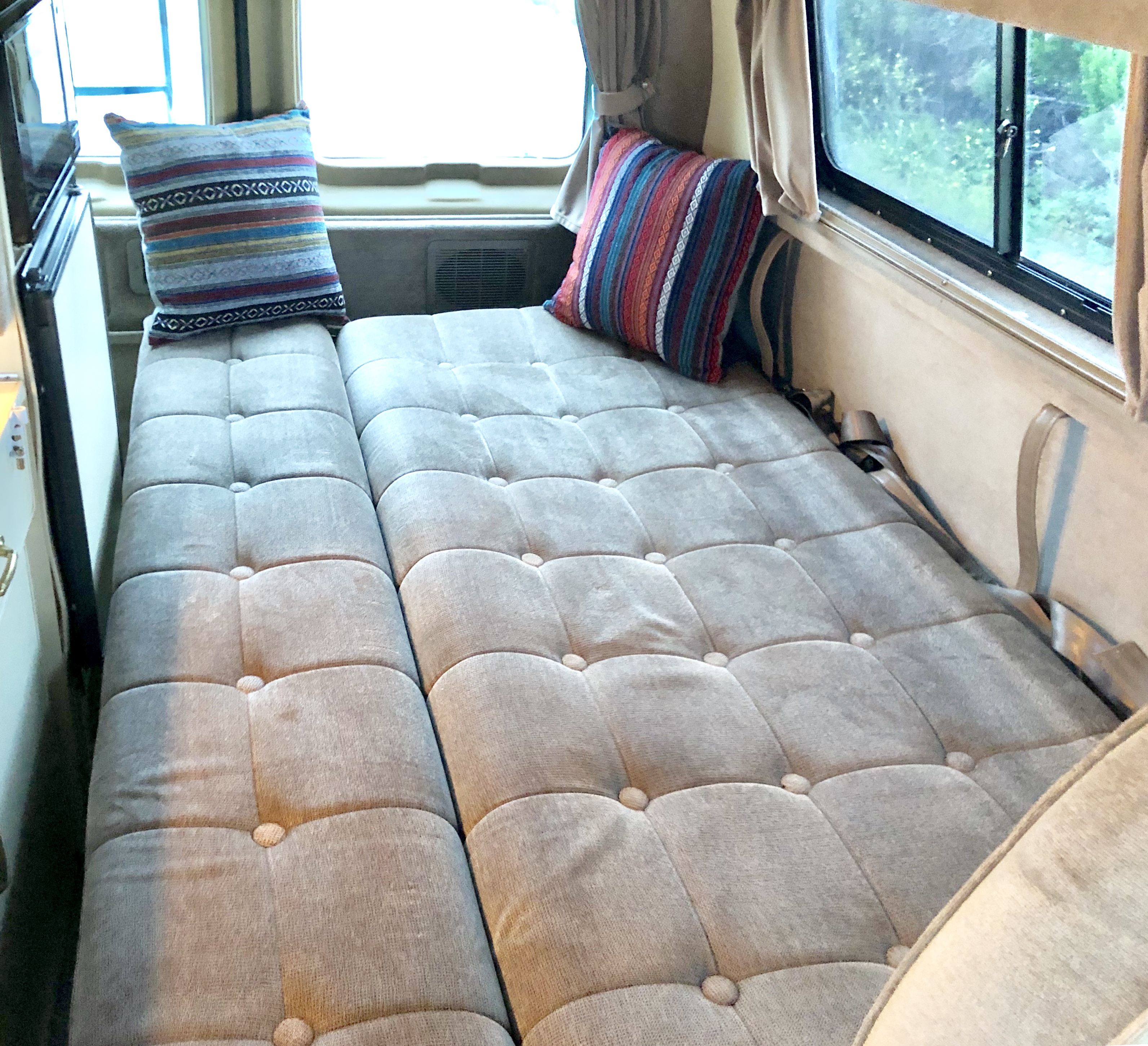 Couch folds down to make a full size bed. . Ford Econolline 250s 1998