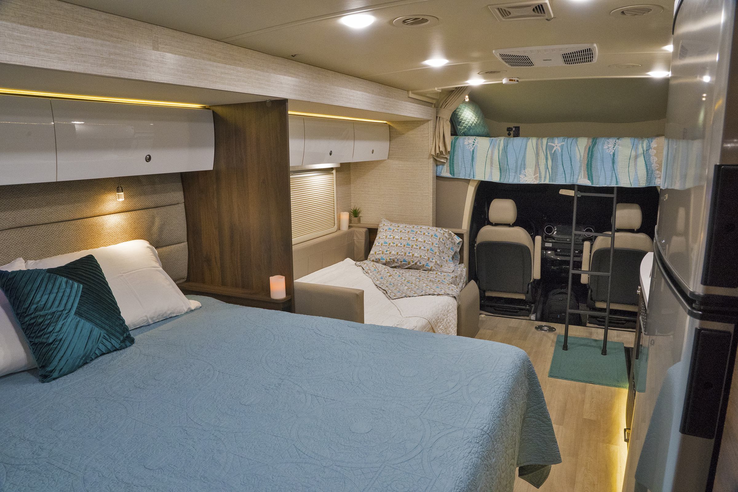 Spacious RV rental: main bed, convertible sofa, and overhead bunk offer comfortable sleeping for all.. Winnebago Navion 24D 2020