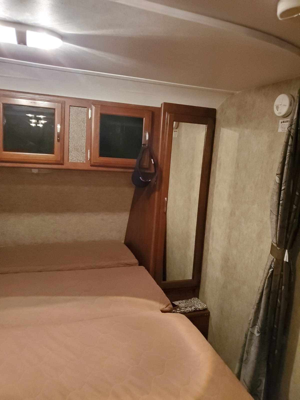 Queen-size Murphy bed (right side).. Keystone Passport 2016