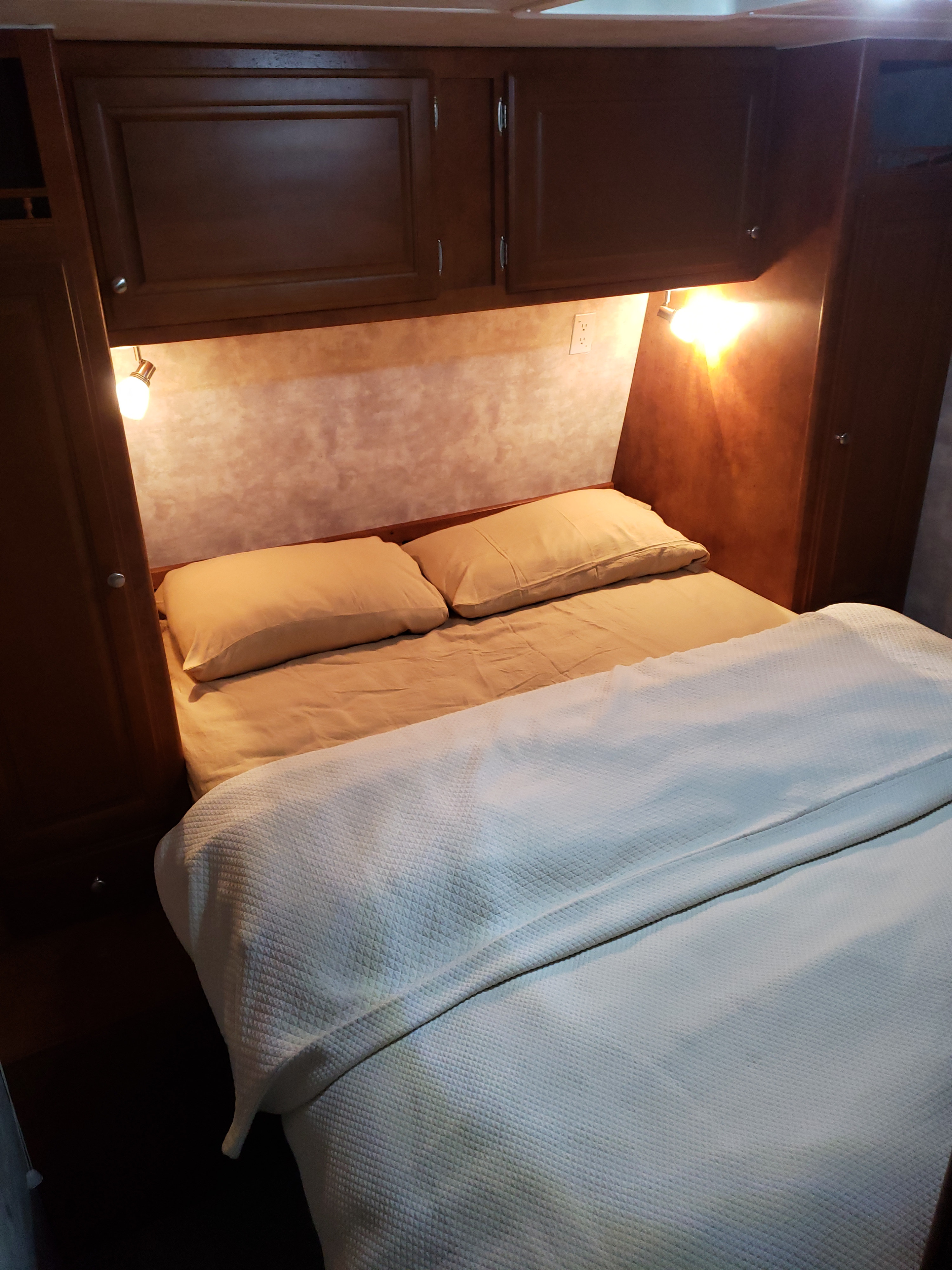A glimpse of the bedroom with more than enough storage and a brand new pillow top 14 inch thick mattress! . Pacific Coachworks Tango 2010