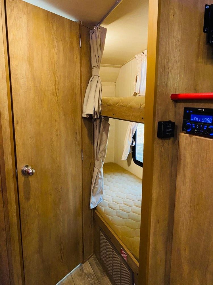 Hideaway bunks for extra sleep options. Gulf Stream Vintage Cruiser 2021