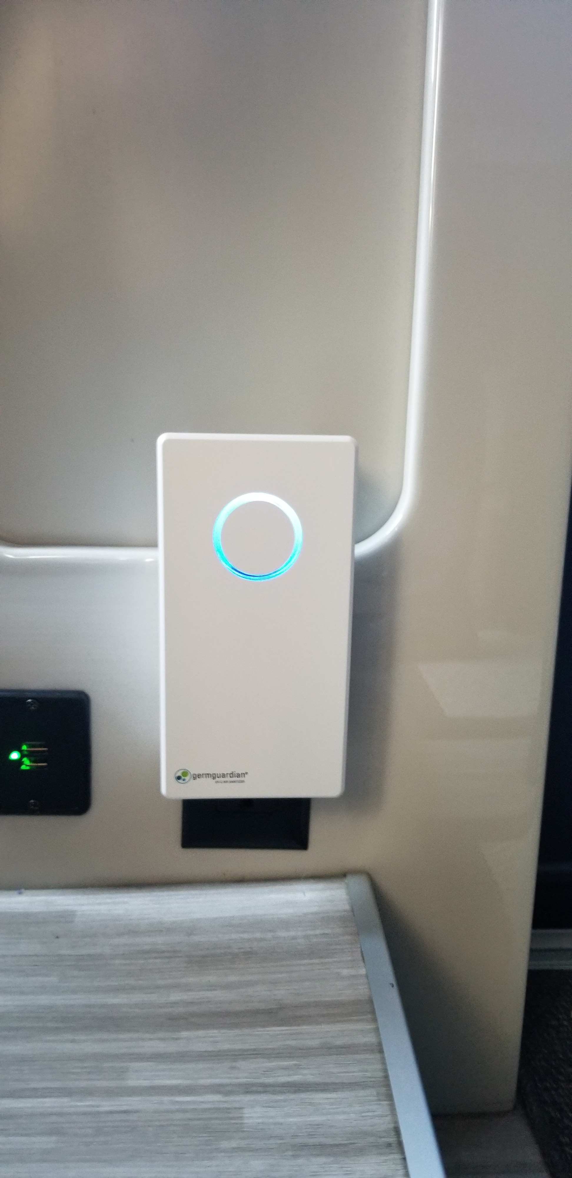 This RV rental interior features a GermGuardian air purifier with a glowing blue light and handy USB charging ports.. Thor Sequence 2021