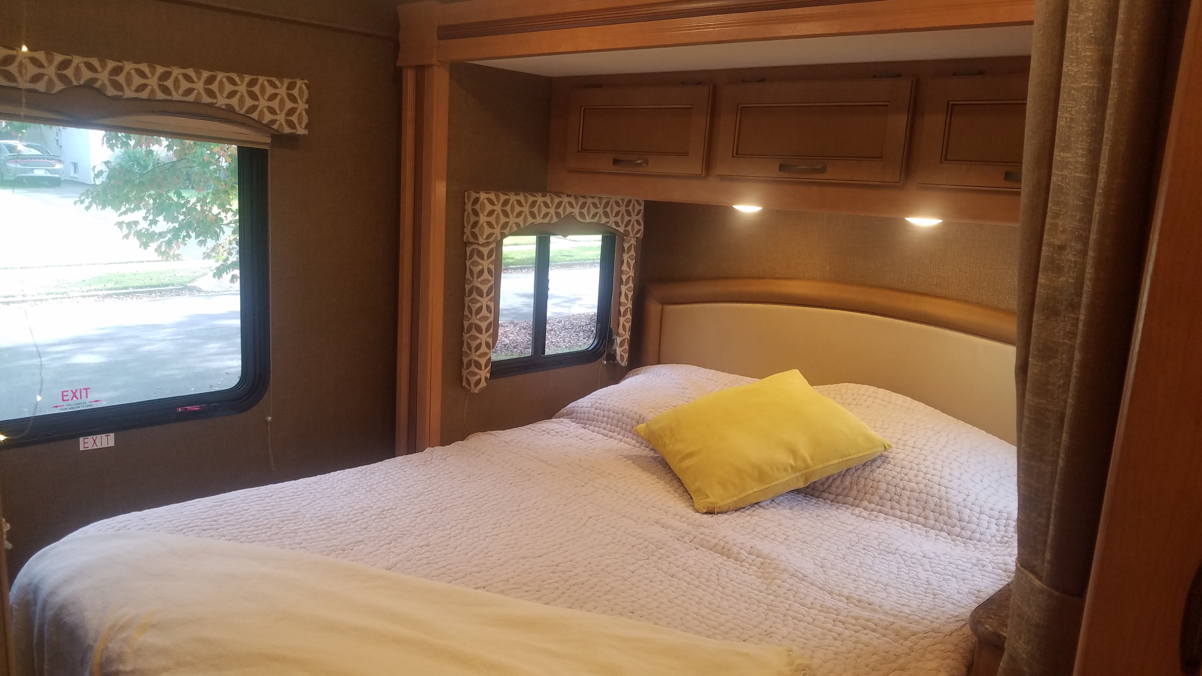 Queen master bed with foam mattress topper - the "Master Suite"!. Thor Motor Coach Four Winds 2017