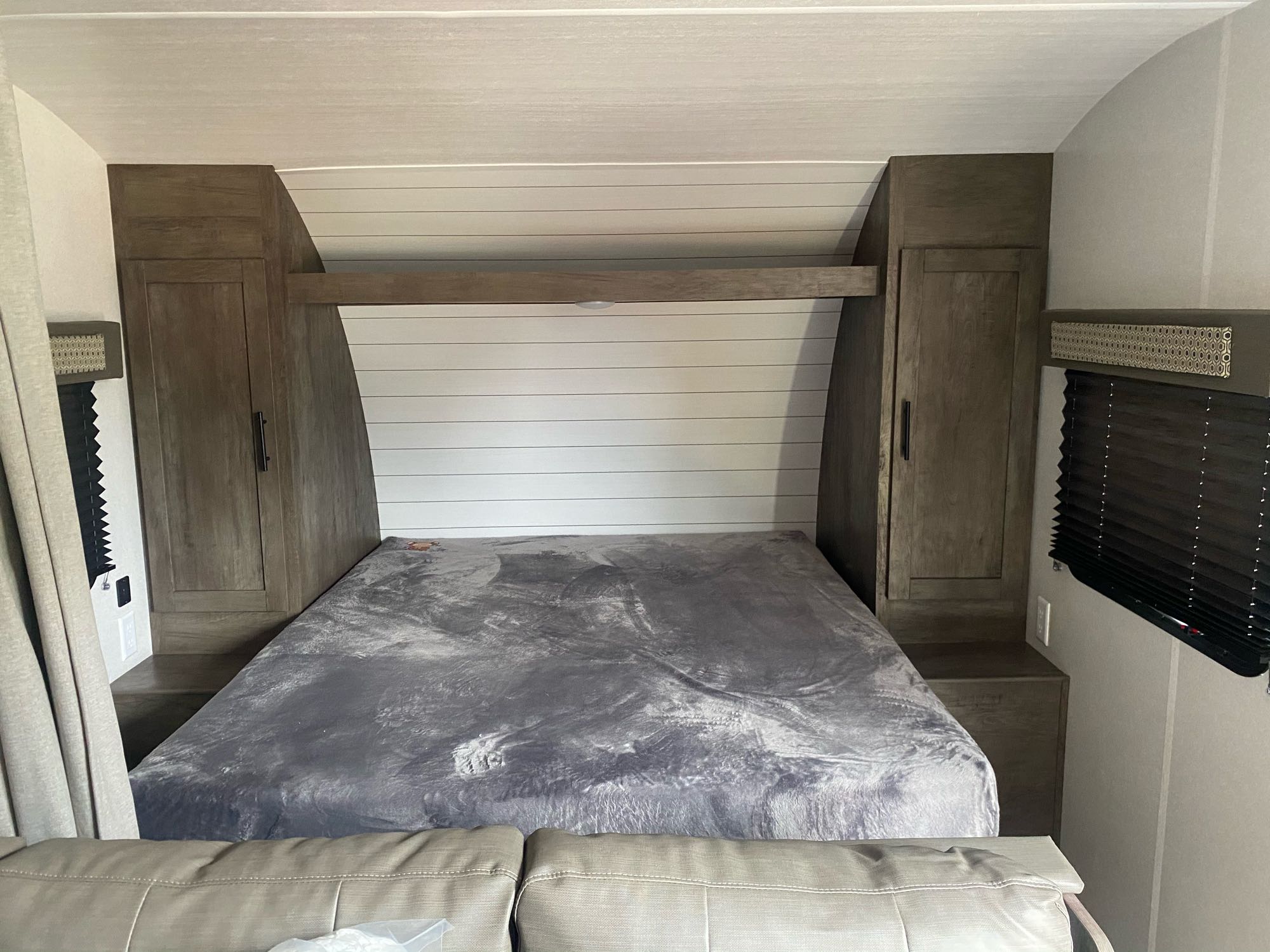 Queen size bed with extra topper.  Good and ample storage in closets and under bed.  Electrical outlets are handy.  Watch TV from here.. Forest River SJT268BH-CA 2021