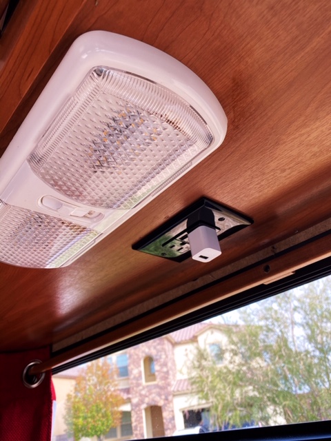 RV rental interior: LED ceiling light, outlet with USB charger, and exterior window view.. Other Other 2017