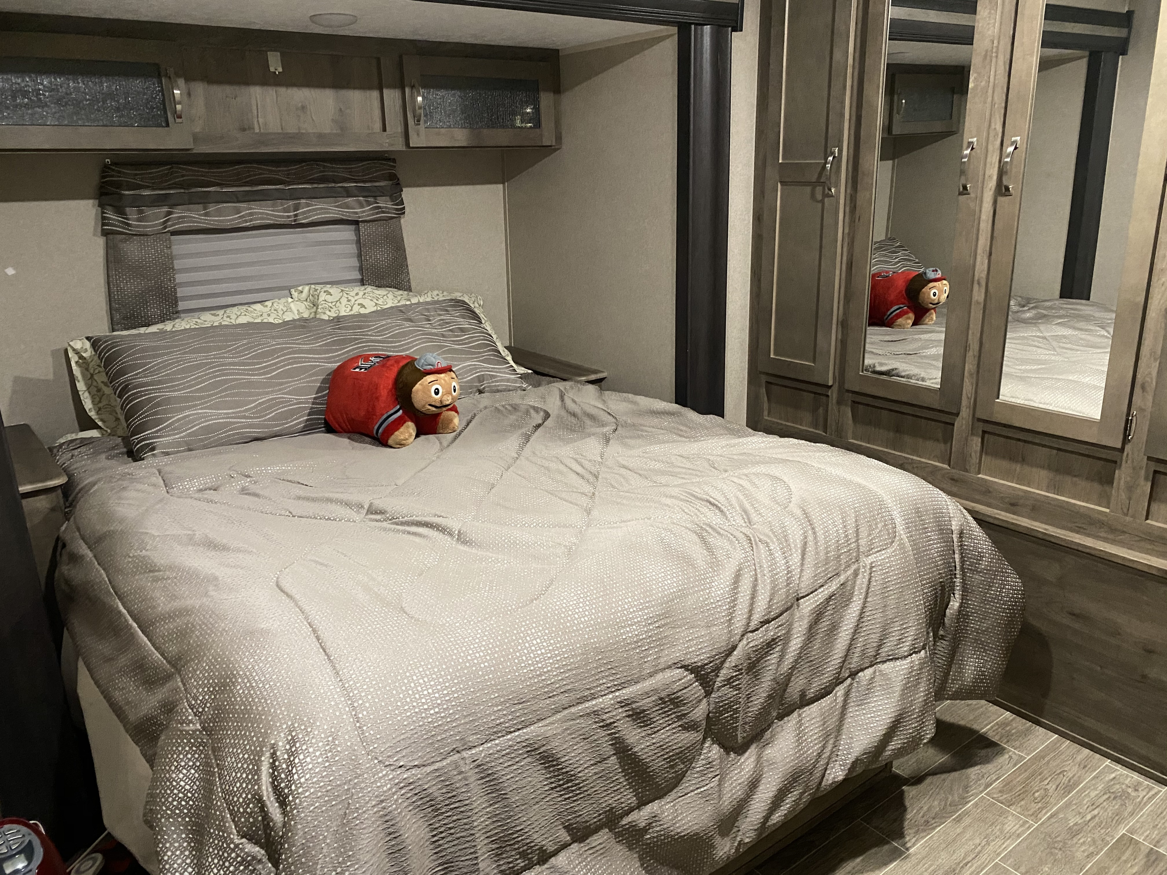 Large master bedroom, #SleepNumber mattress, overhead cabinets at the head of the bed and closet space galore!. Palomino Puma 2019