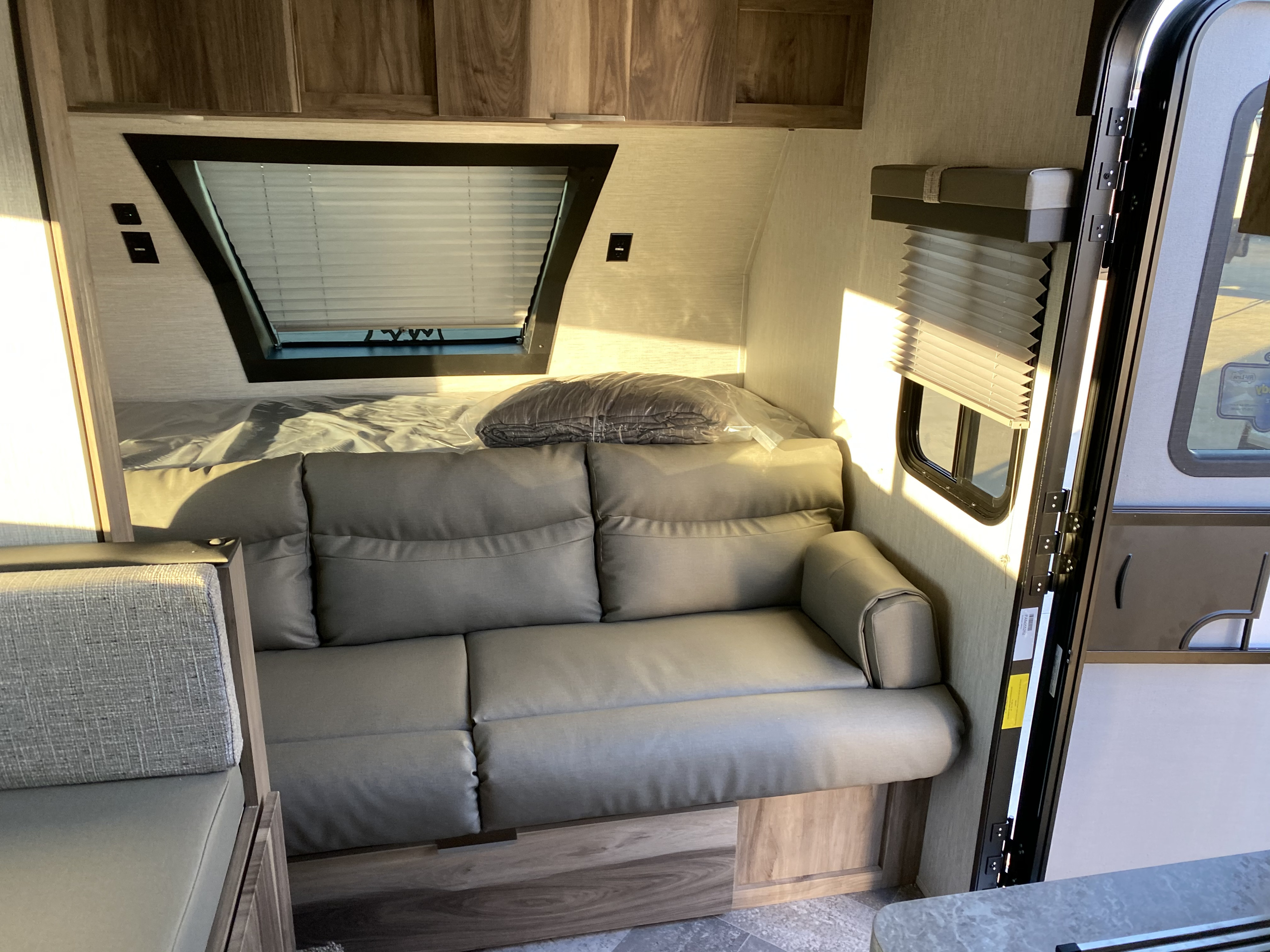 This shows the sofa area which converts to a queen size bed.. Palomino Palomini 2021