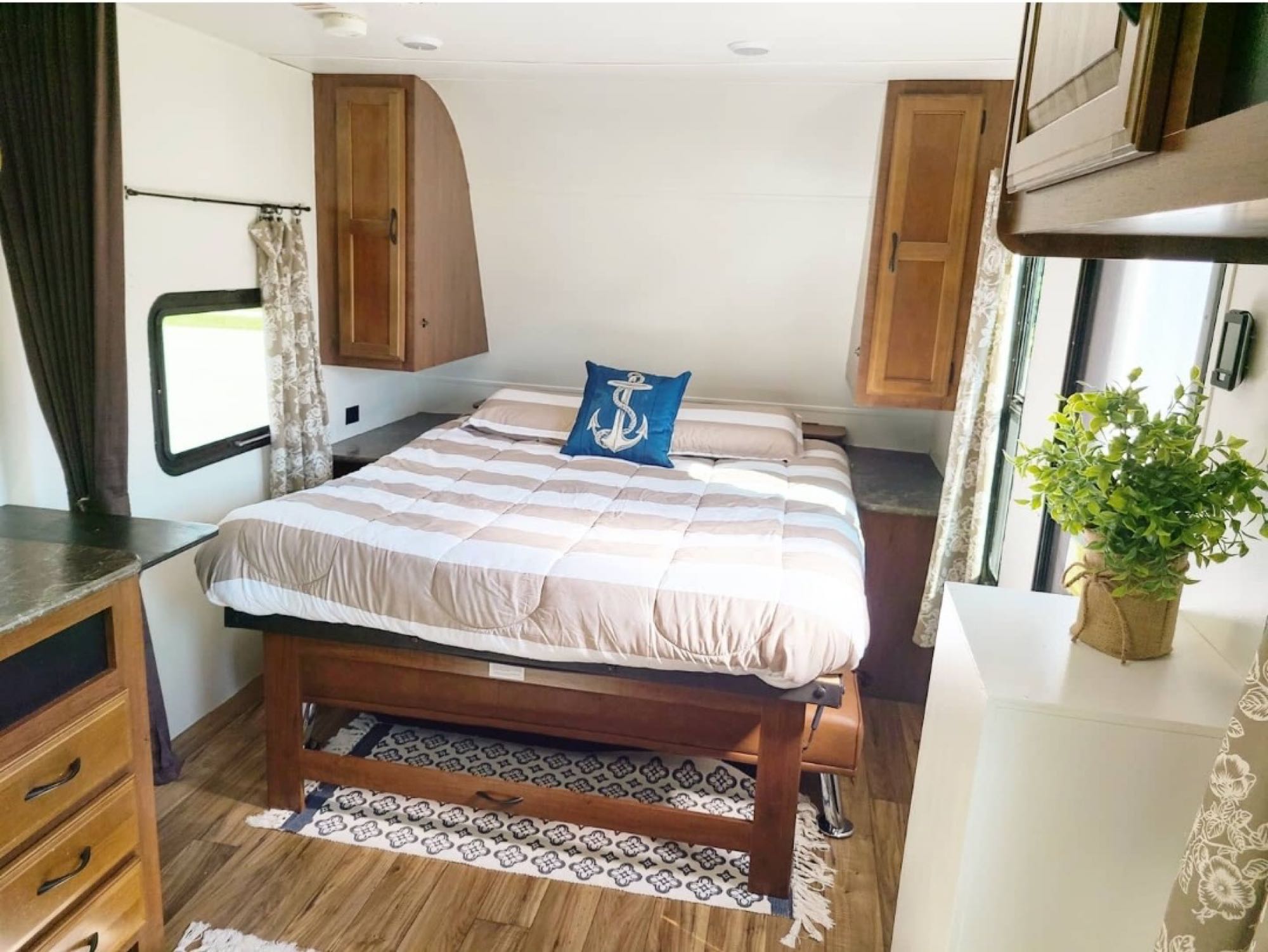 Queen size Murphy bed with wardrobes and charging stations in each side. Jayco Jay Flight 2016