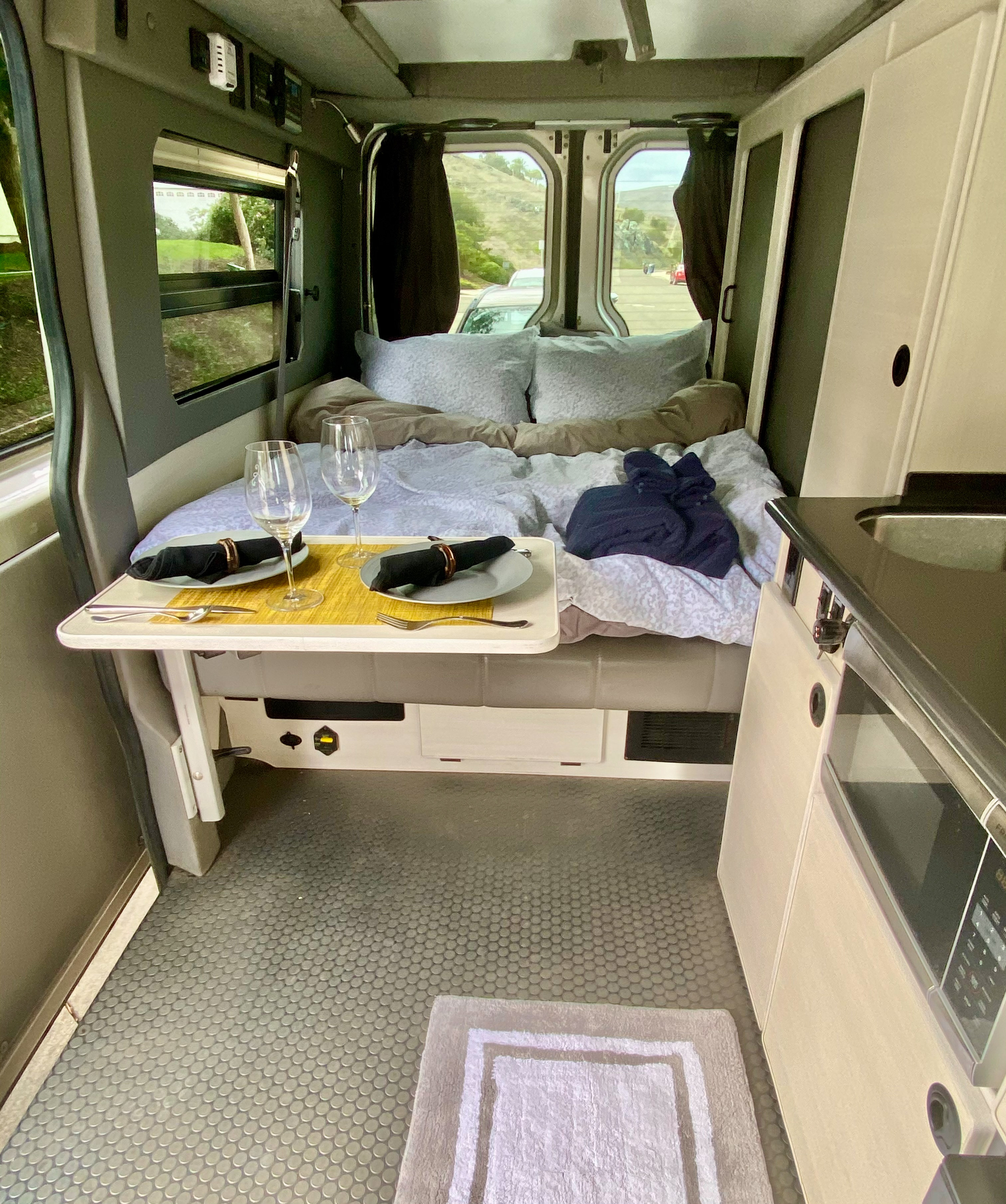 If you choose the let the light in the windows on all sides and penthouse top makes the space feel very large and comfortable.. Sportsmobile 18' 2017