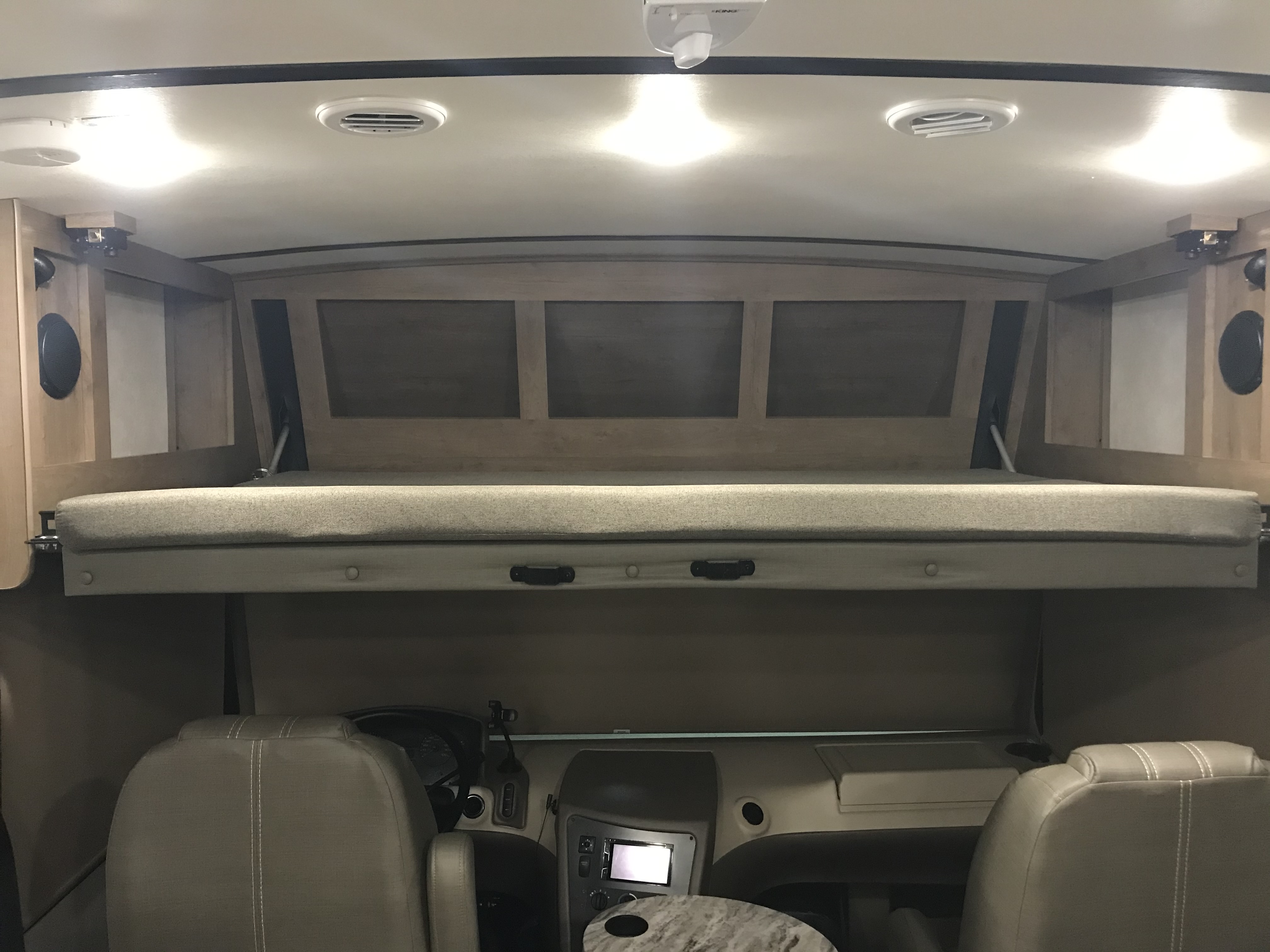 An over the cab bunk!  Yes sir!  Two full sized adults can fit perfectly!  And extra storage!. Forest River FR3 2019