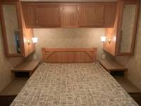 Plenty of closets for hanging clothes and storage above bed. Wall outlets on each side for charging phones or other night time items. . Other Zinger 2006