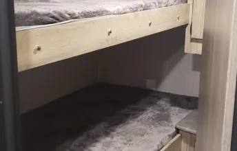 4 bunk beds in one room with closed door privacy. Forest River Palomino Puma XLE Lite 2021