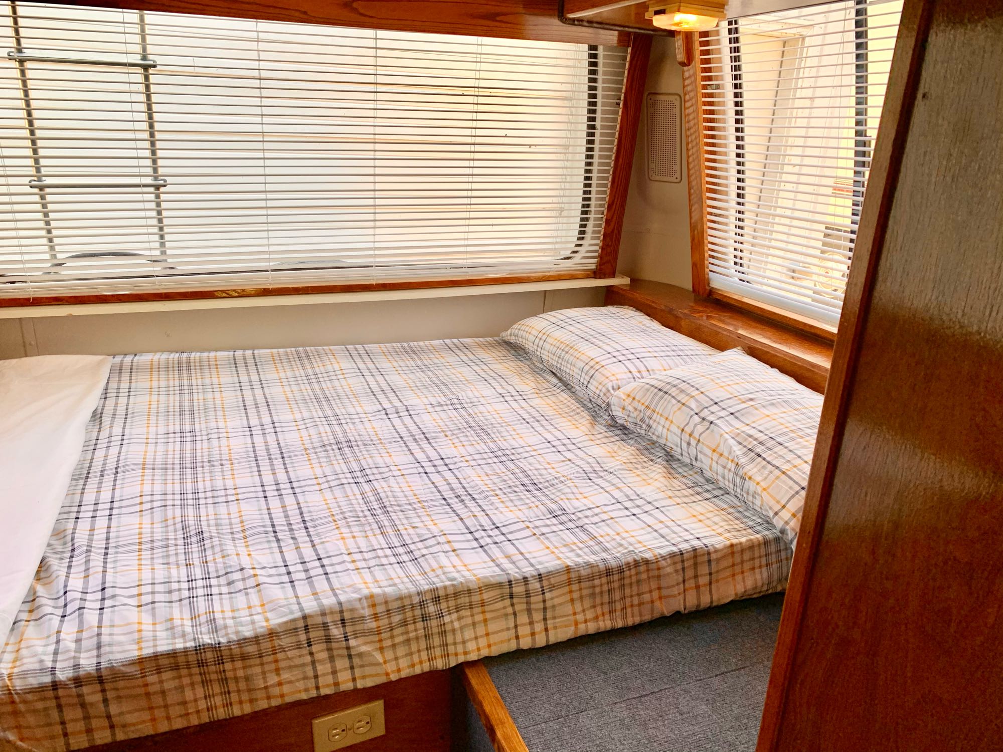 Comfy Rear Bedroom has a privacy door and windows all around!. Gmc Classic Royale 1978