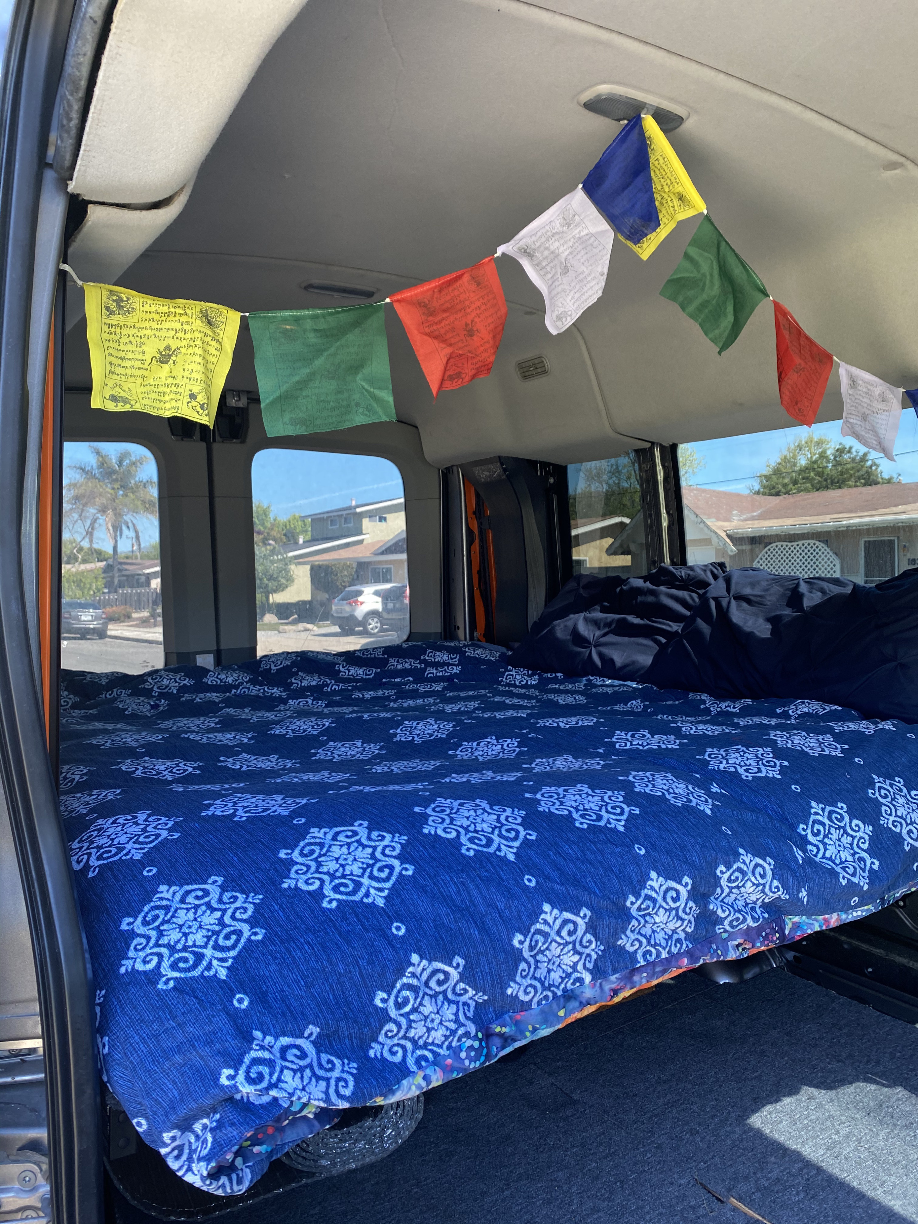 The queen bed features a memory foam mattress and down comforter. Bring your own pillows!. Ford Transit Custom 2014