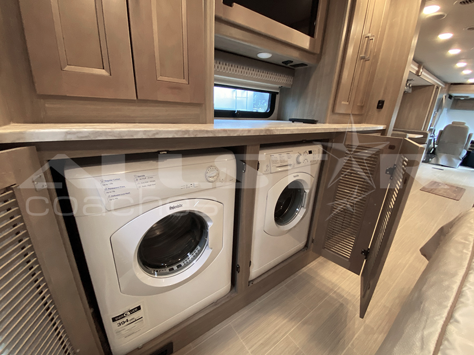 RV rental convenience: This motorhome features a compact washer & dryer, neatly built-in under the counter for on-the-go laundry.. Coachmen Sportscoach 2020