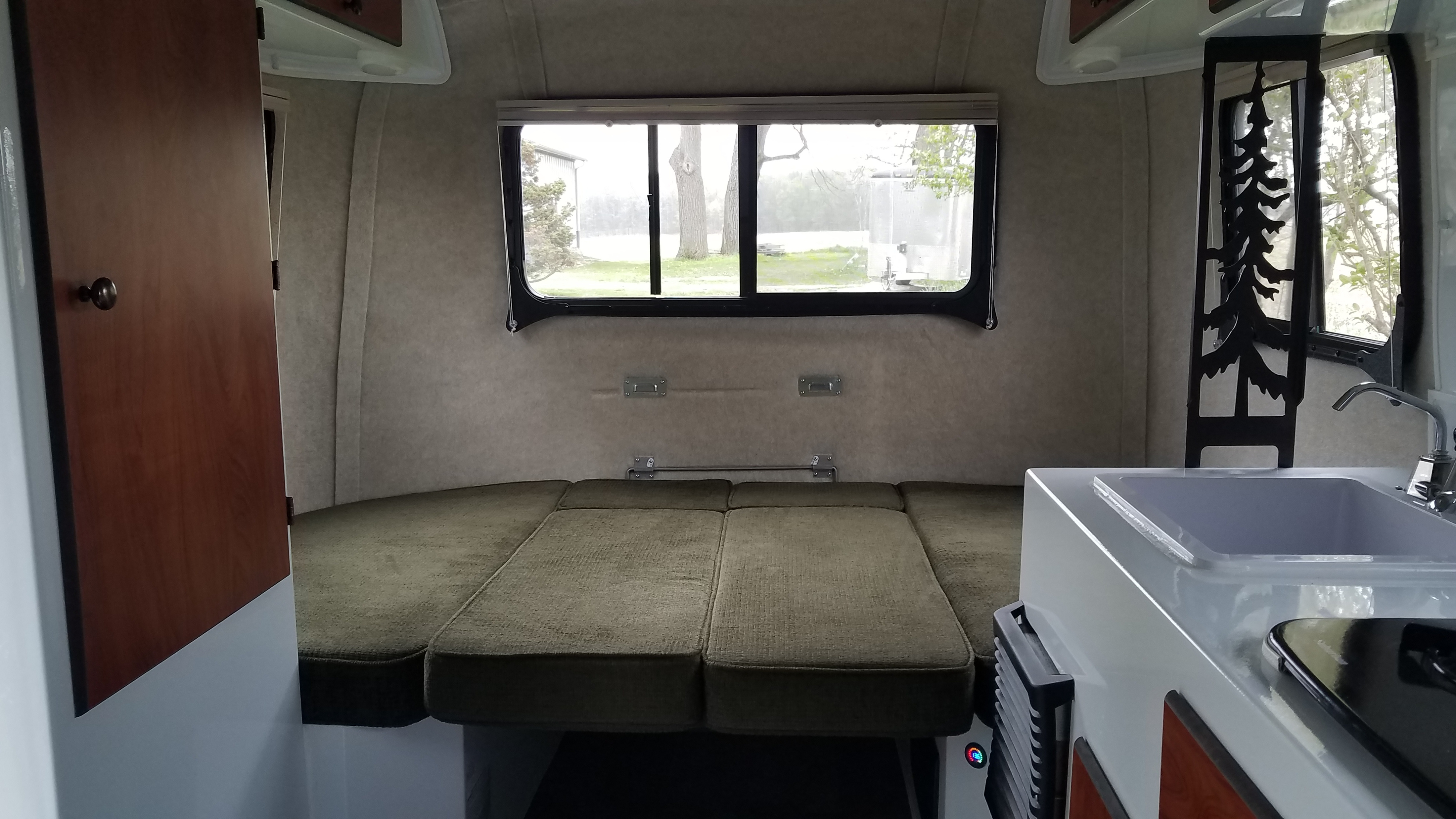 Dinette turned down into a bed. Scamp 13' 2021