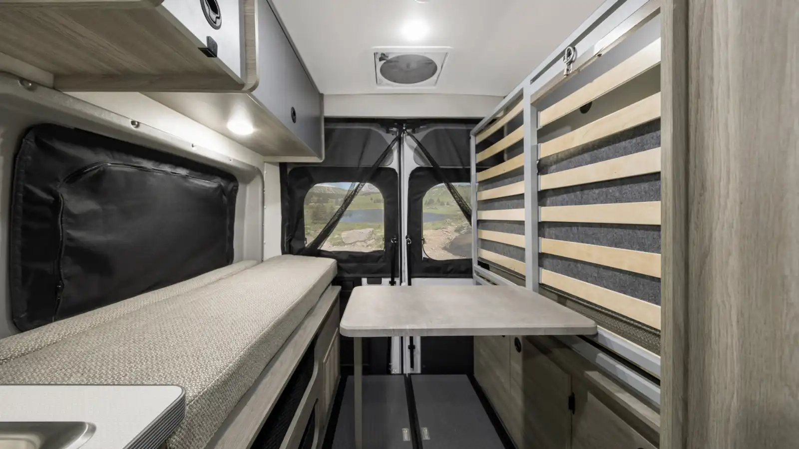 It's like a murphy bed. Very comfy.. Winnebago Solis 59PX 2022