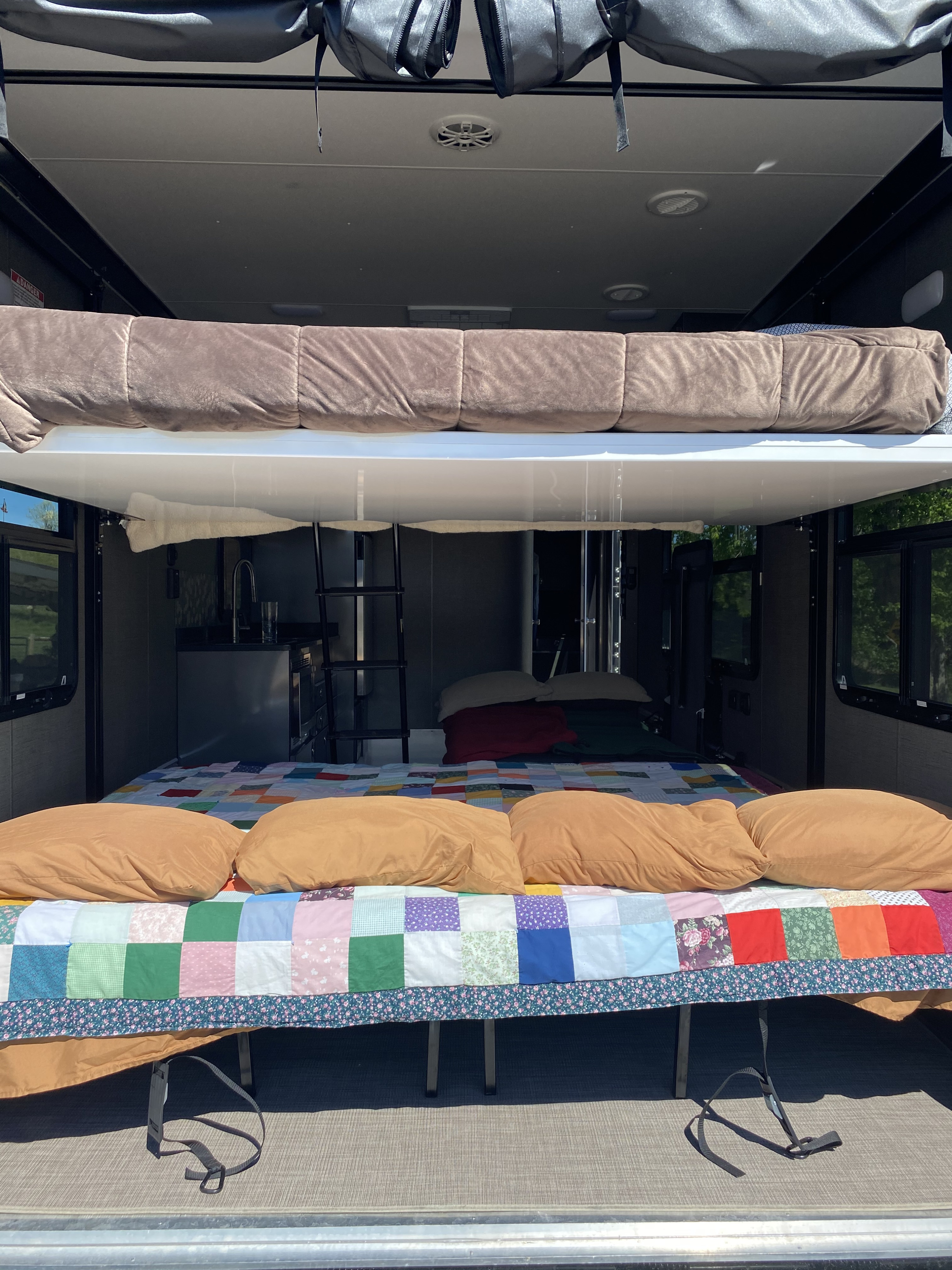 Bunk with the ramp open and dropdown windows up. Aluminum Trailer Company Other 2021