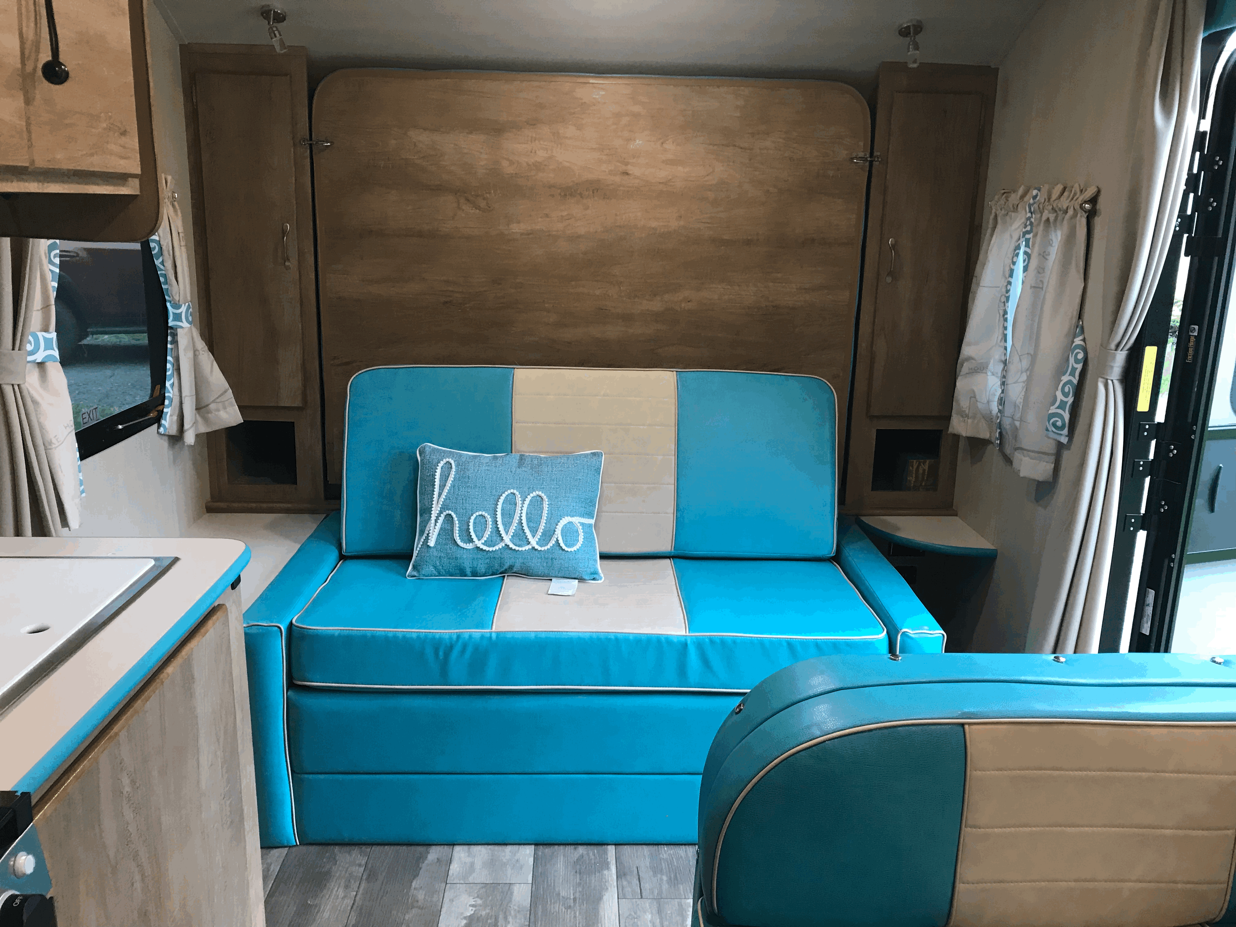 Chesterfield for lounging with jackknife bed behind. . Gulf Stream Vintage Cruiser 2021