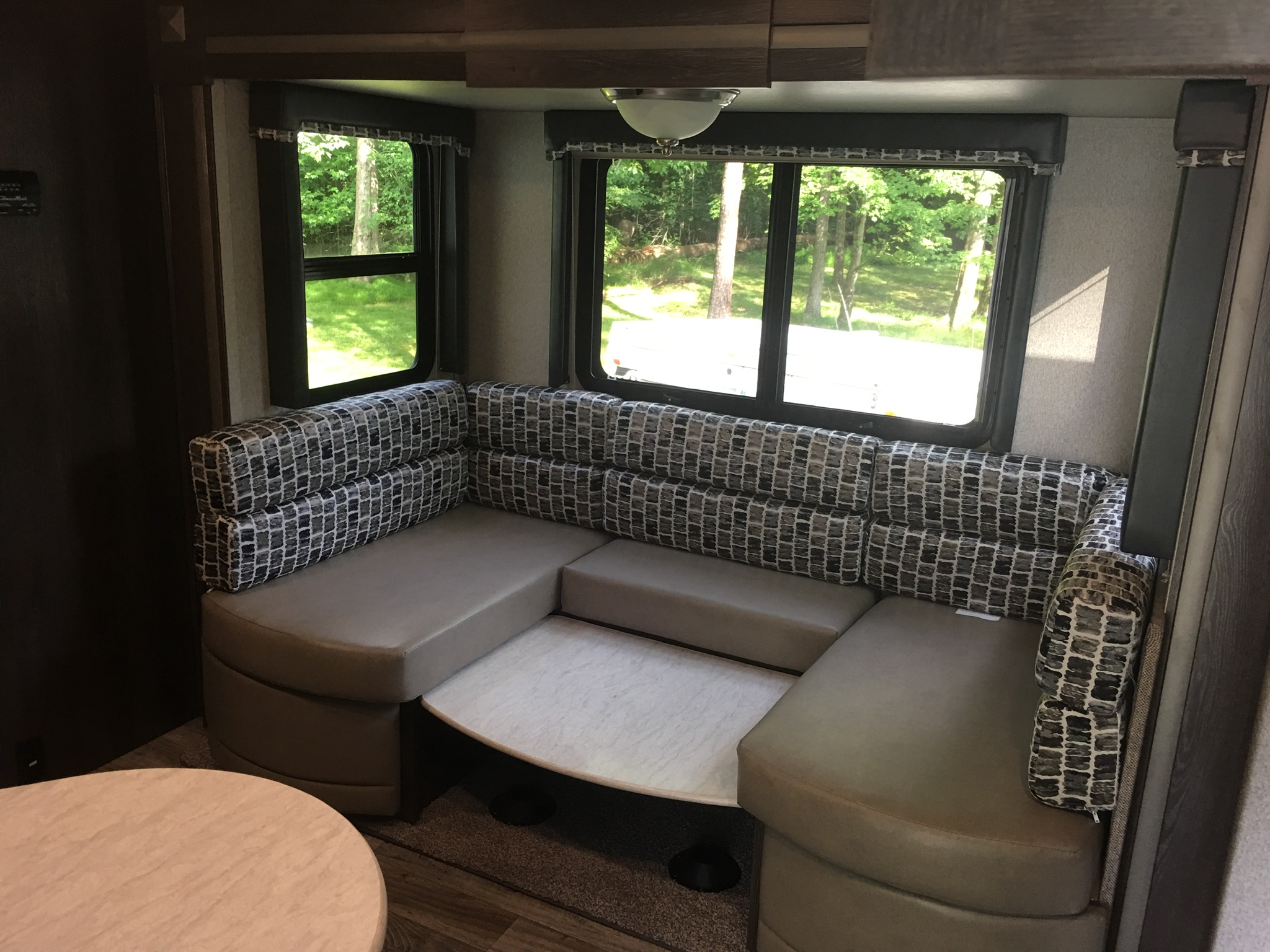 Dinette broken down for extra bed. Keystone Outback 2018