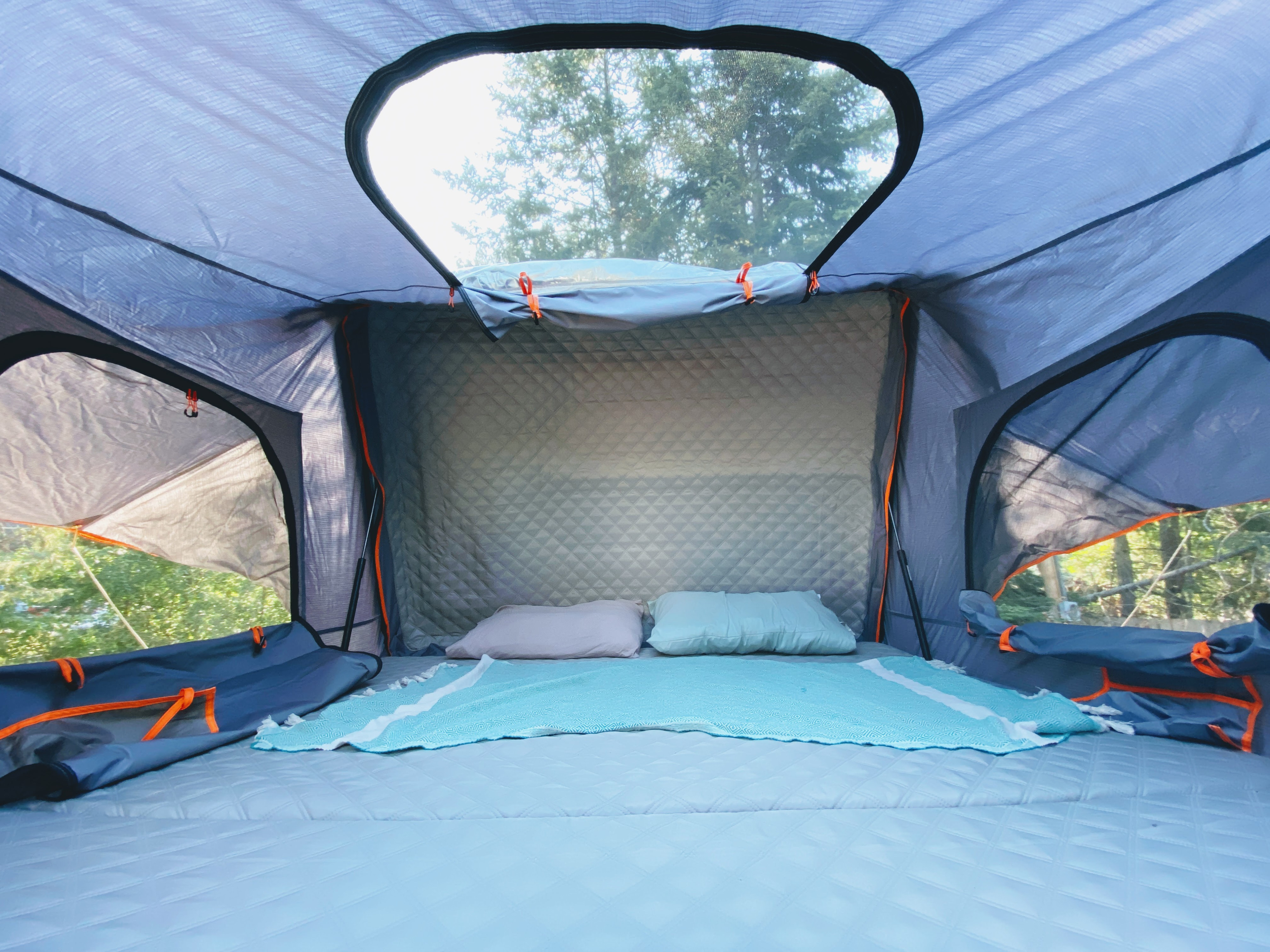 The rooftent folds out into a super comfy larger-than-king bed with easy open windows and a skylight!. Honda Pilot 2005