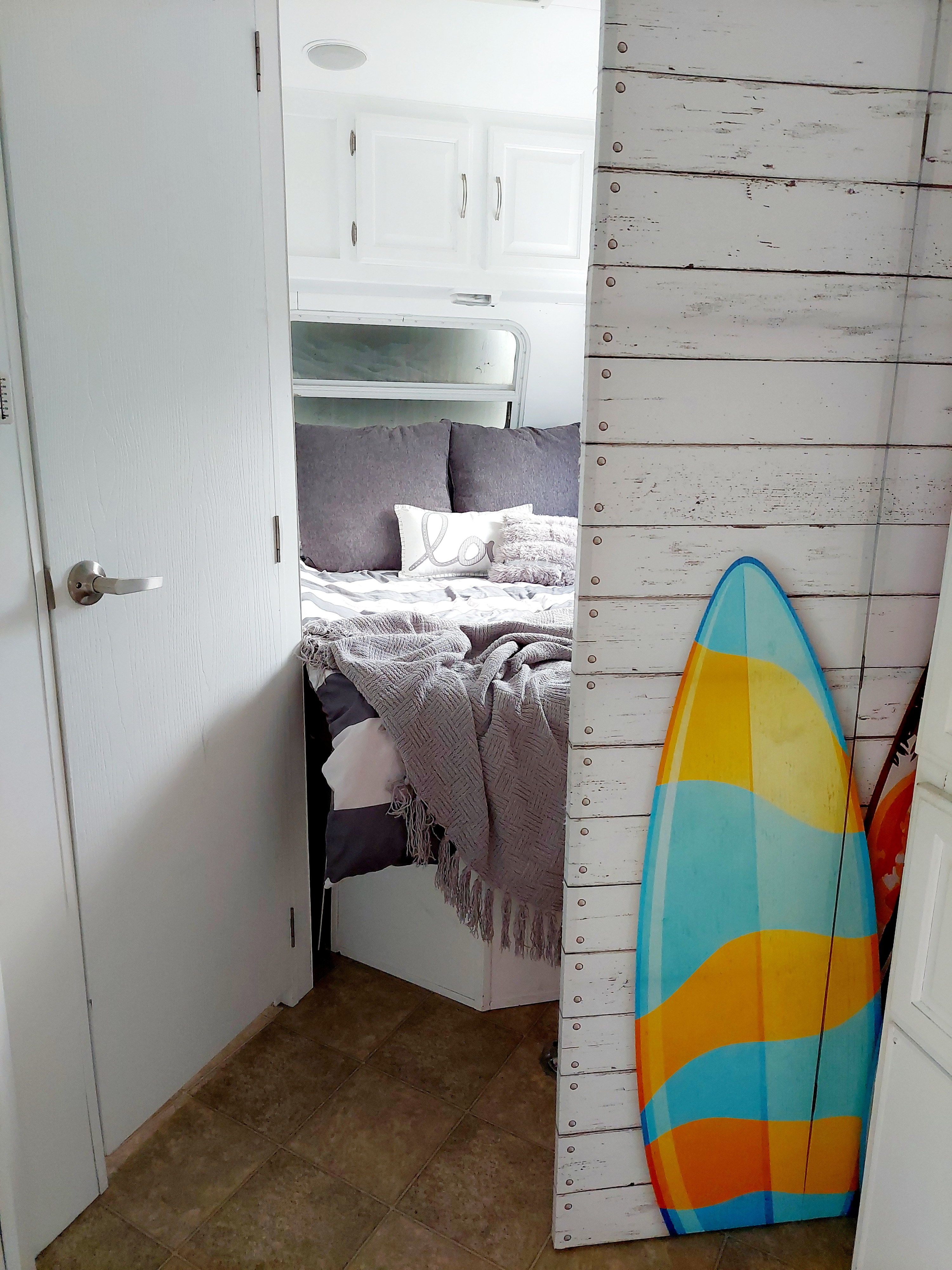 Cute and stylish master bedroom with privacy slider. Forest River Sandpiper 2008