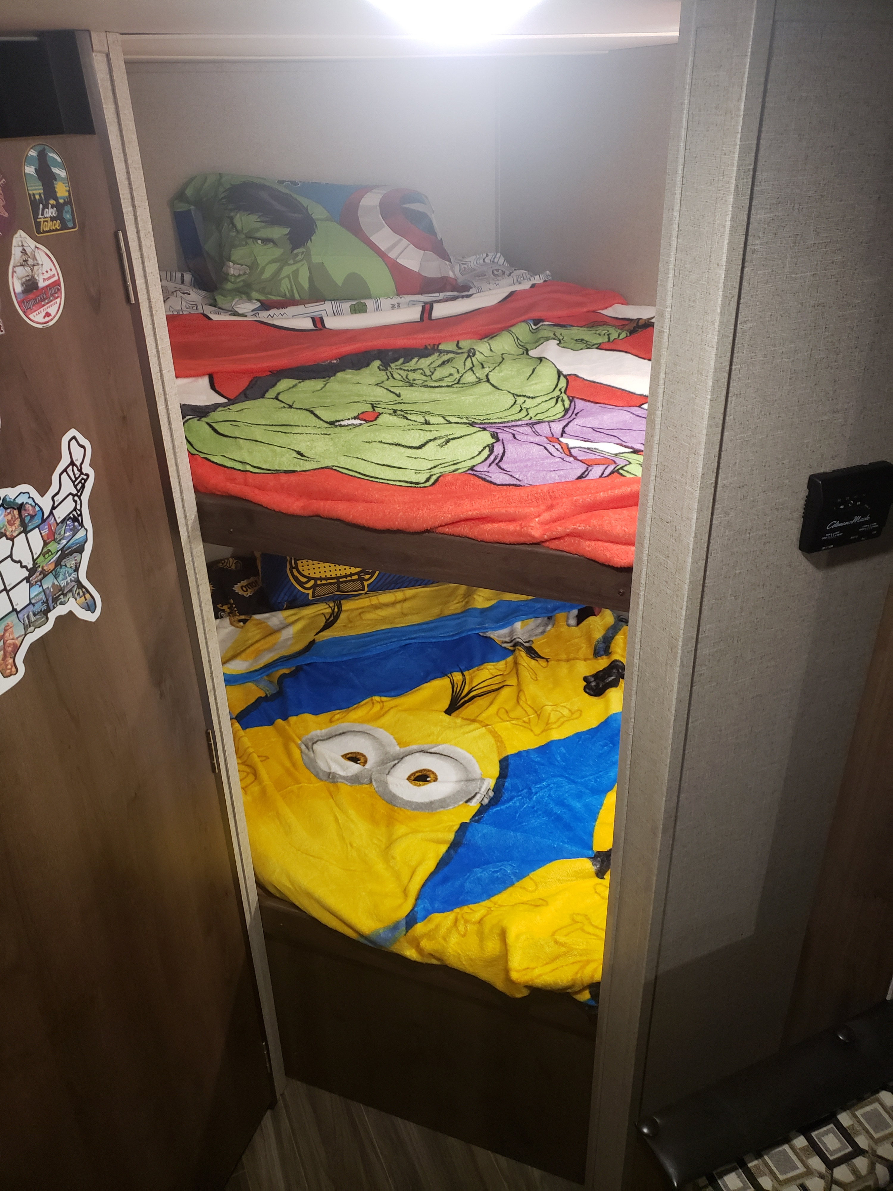 RV rental: Bunk beds with Hulk & Minion blankets offer cozy sleeping in this recreational vehicle interior.. Shasta Oasis 2019