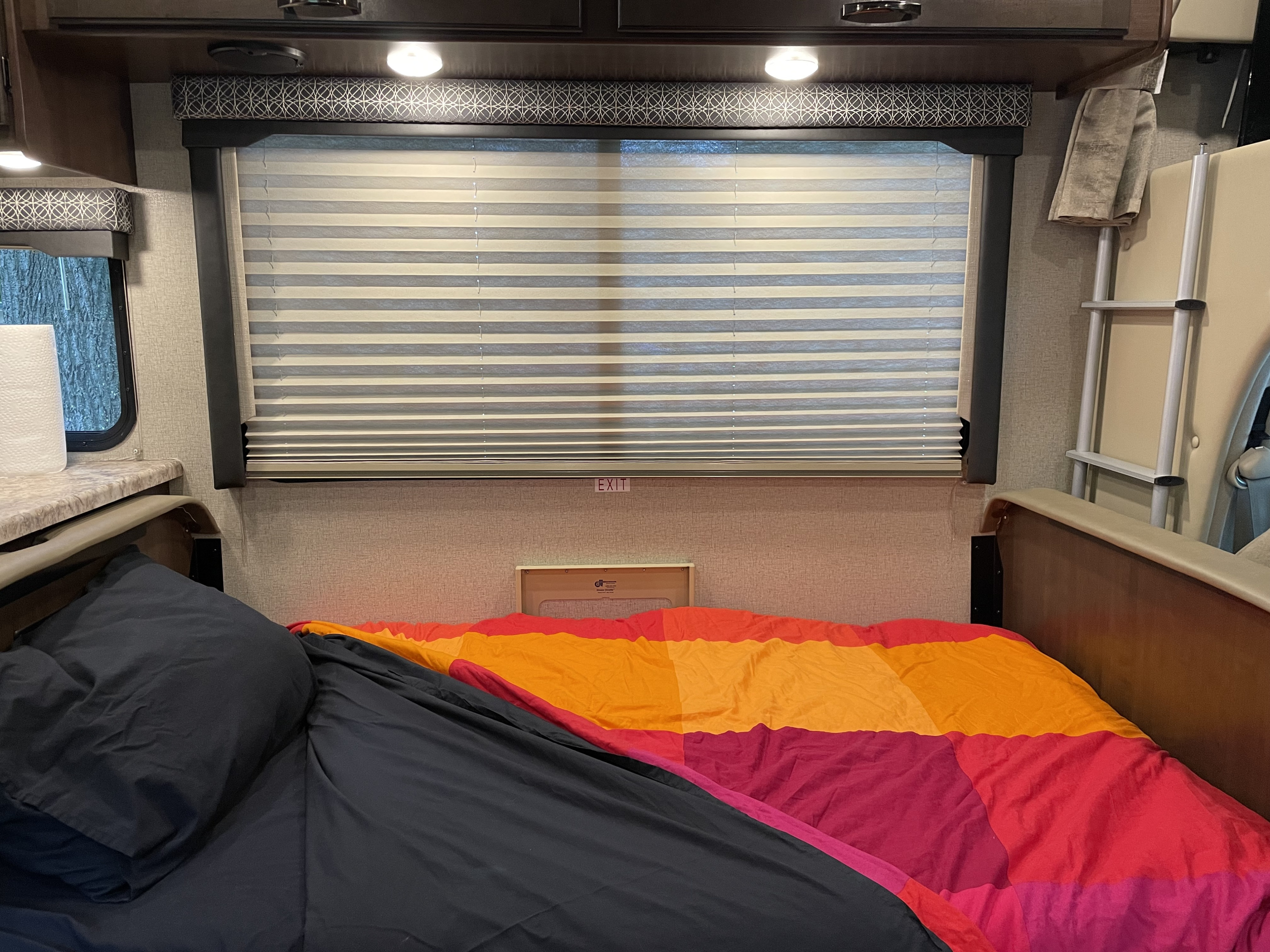 Dining table slides down smoothly transitioning the dinette into a bed.. Thor Four Winds 2020