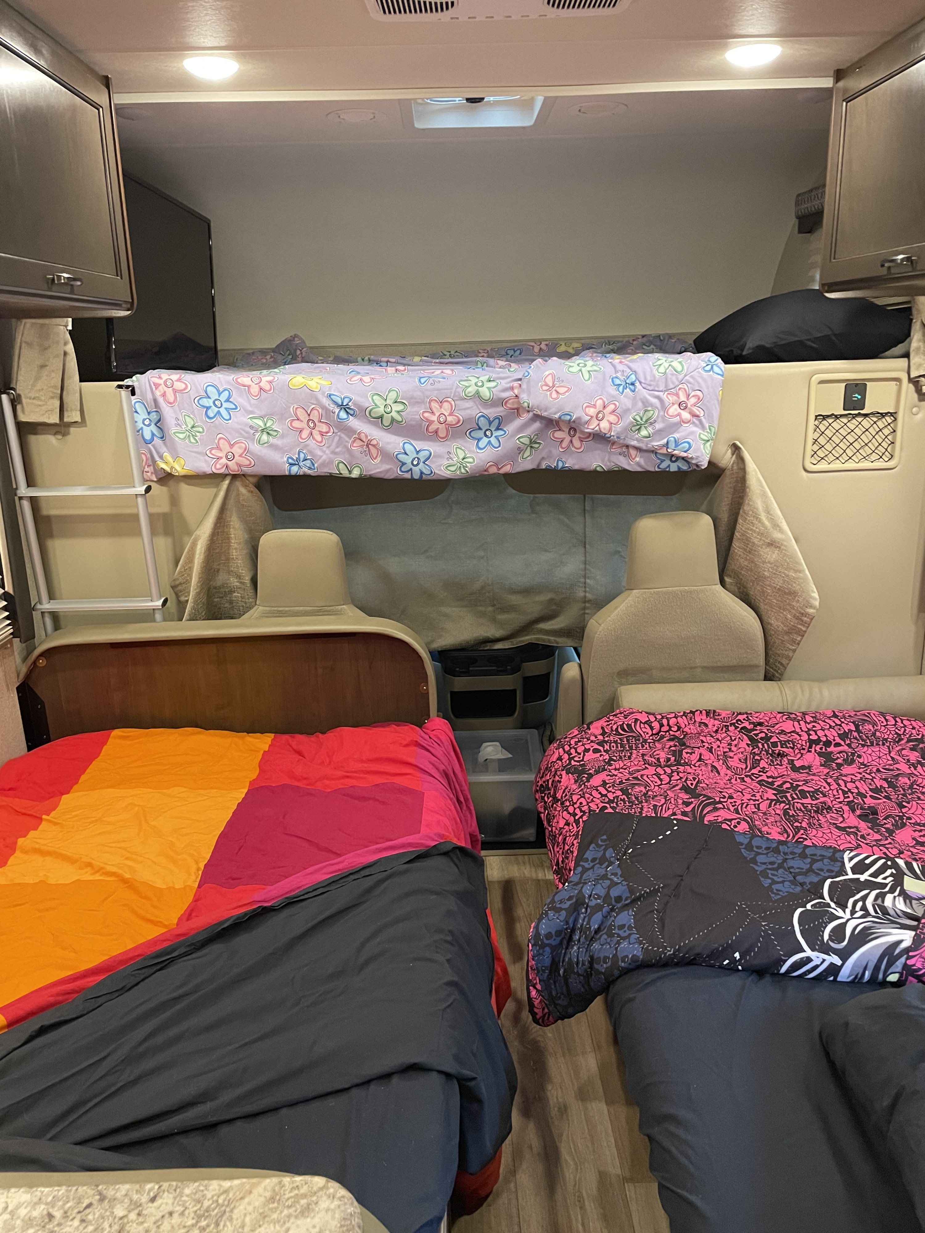 Converting the dinette and sofa provides three separate beds, each with two overhead reading lights. USB ports available to charge your devices. . Thor Four Winds 2020