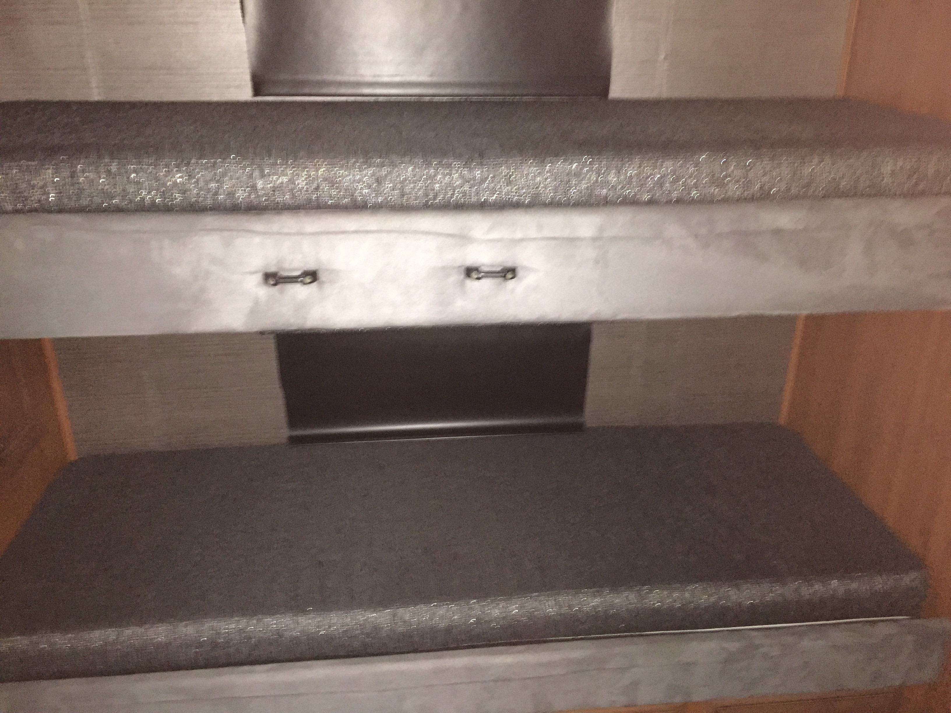 Bunk beds. Each has a DVD player with a fold down screen and a set of wireless headphones.
. Fleetwood Discovery 2014