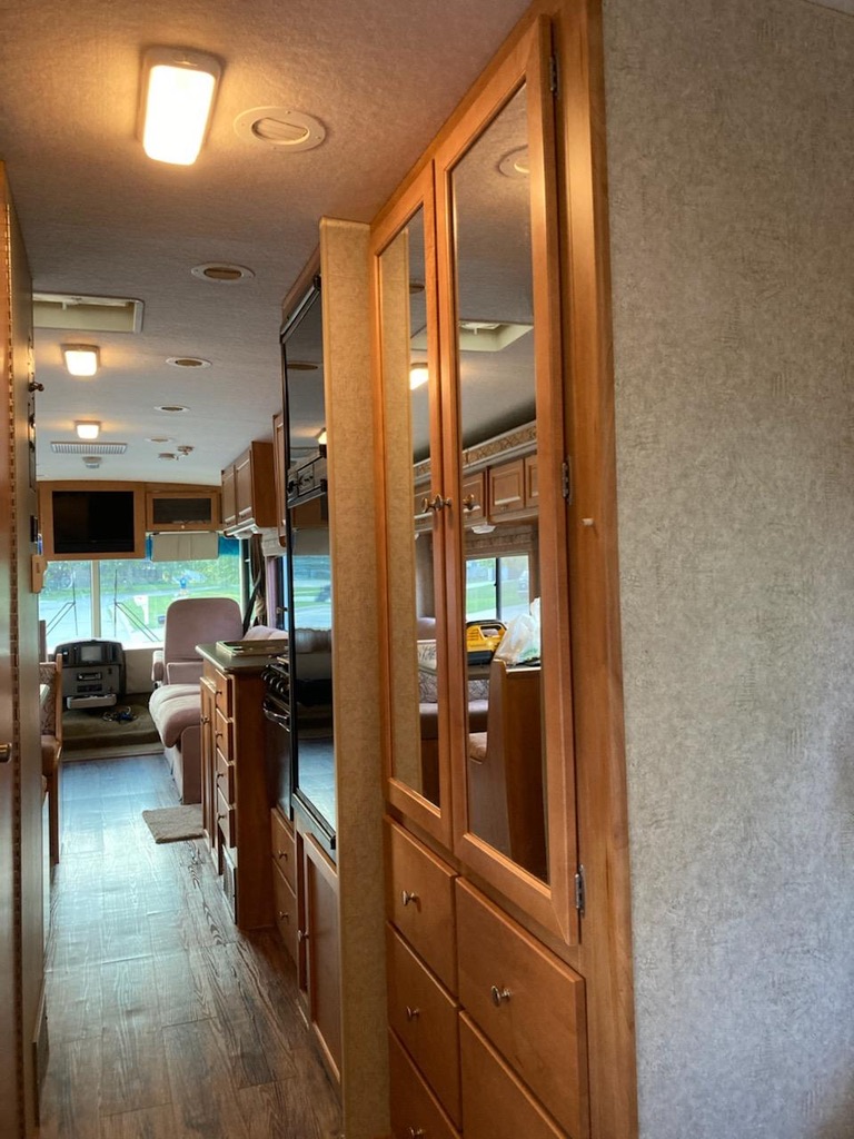 Plenty of area for one of the closets in the master bedroom. . Winnebago Vista 2008