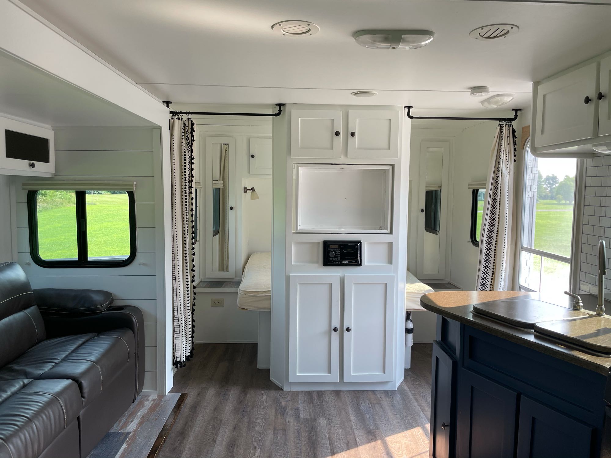 Modern, spacious rv rental interior with living area, beds, and kitchen for comfortable travel.. Cruiser Rv Corp Shadow Cruiser 2011