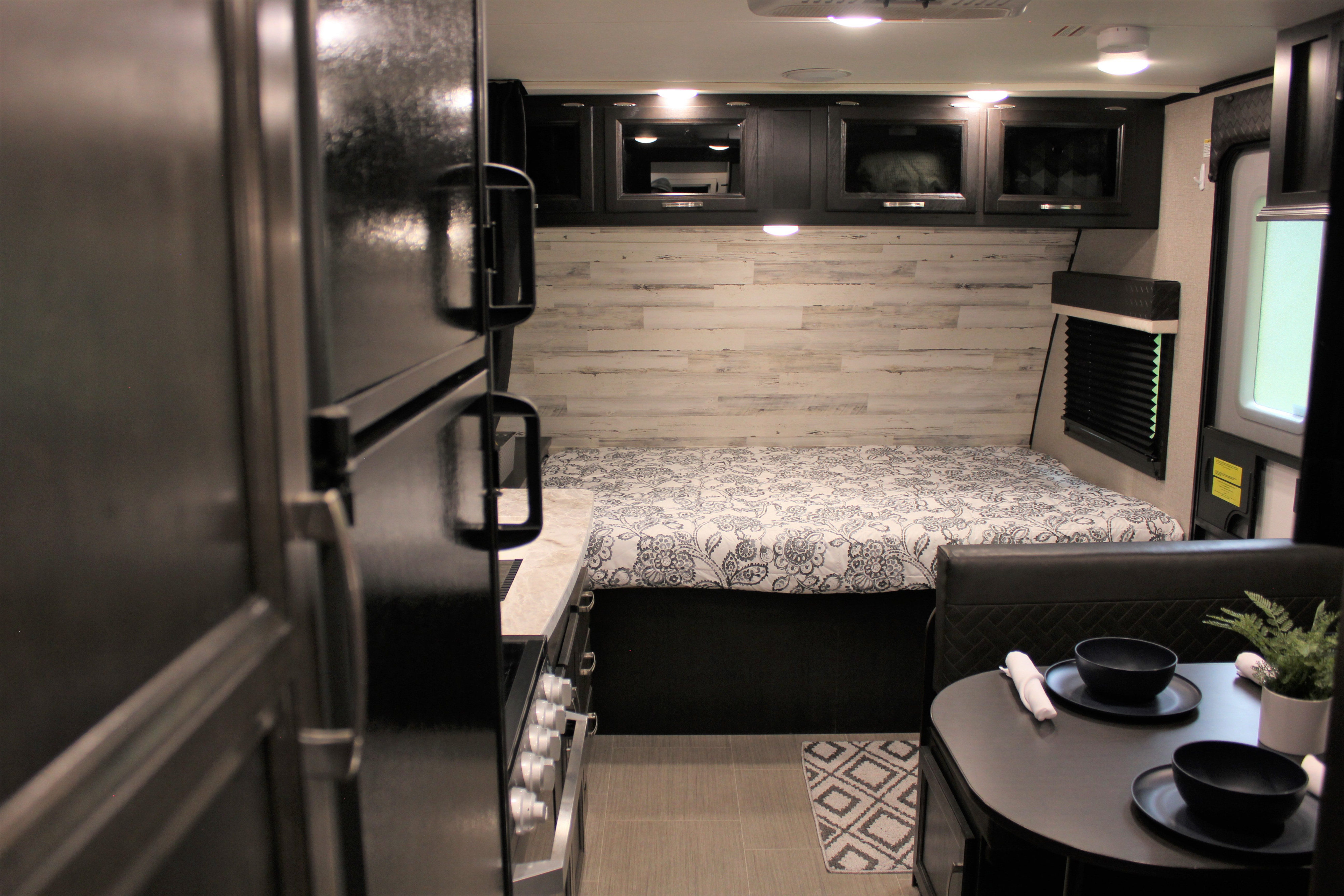 Privacy curtain, lights, outlet and  USB charging by bed. Extra Storage above and under bed.. Jayco Jayco 2020