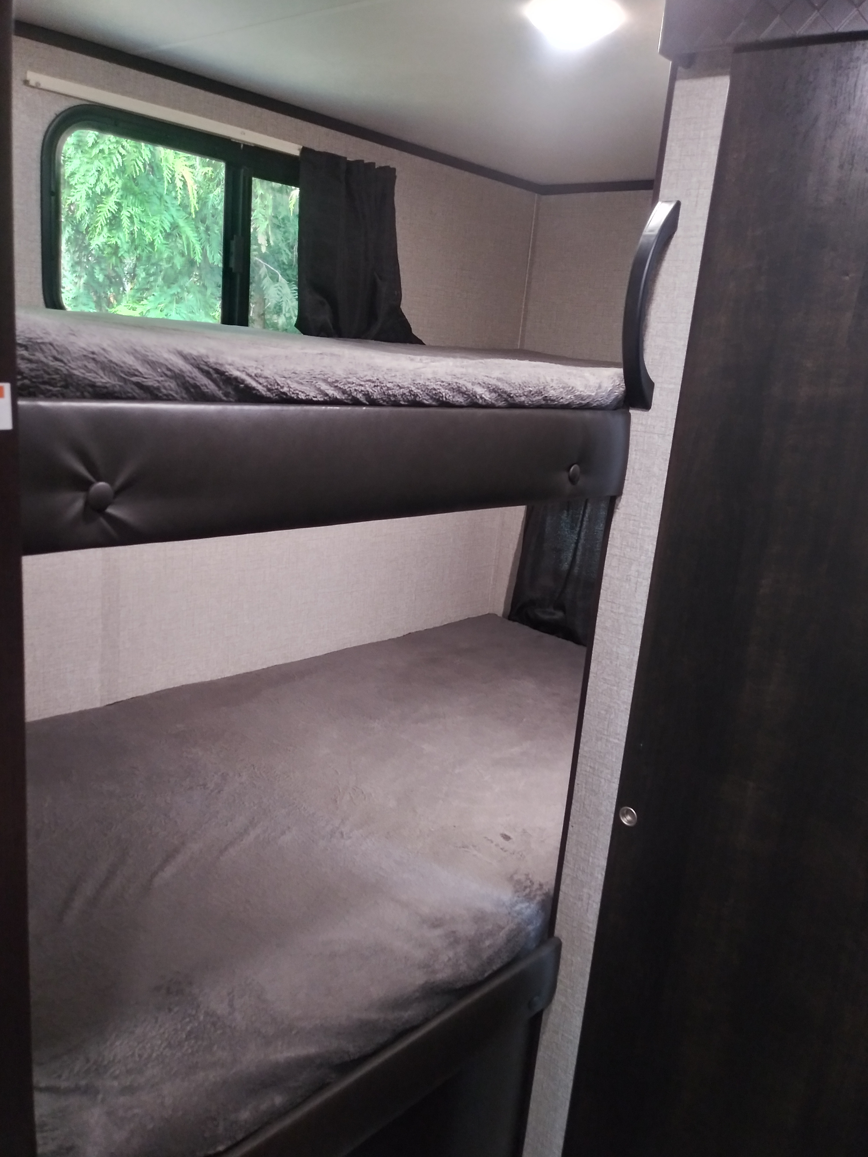 Privacy curtain, lights, outlet and small shelf in each bunk.. Jayco Jayco 2020