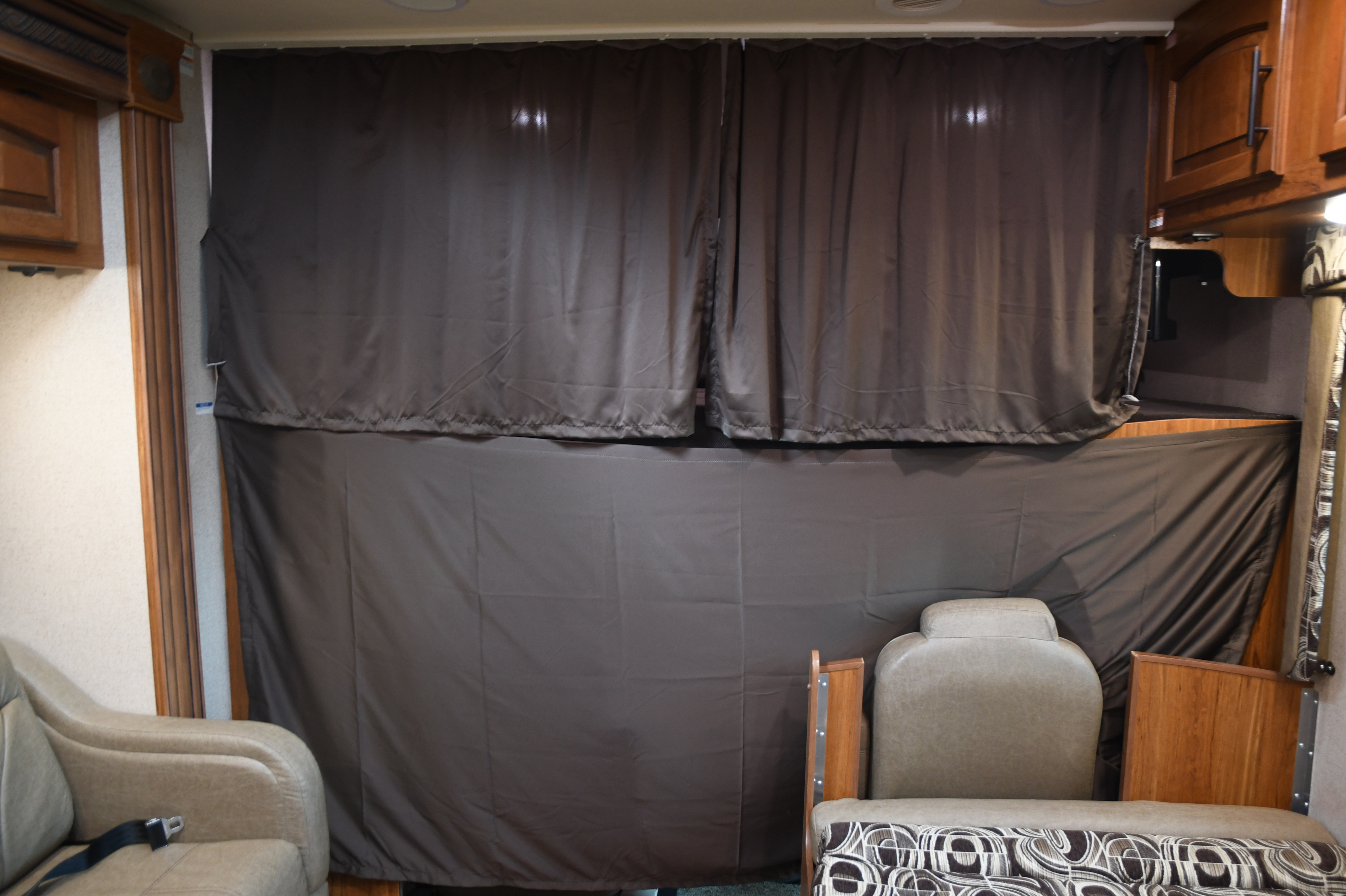 Privacy curtains for the bunk bed and rest of the occupants from those outside the rig.. Jayco Greyhawk 2017