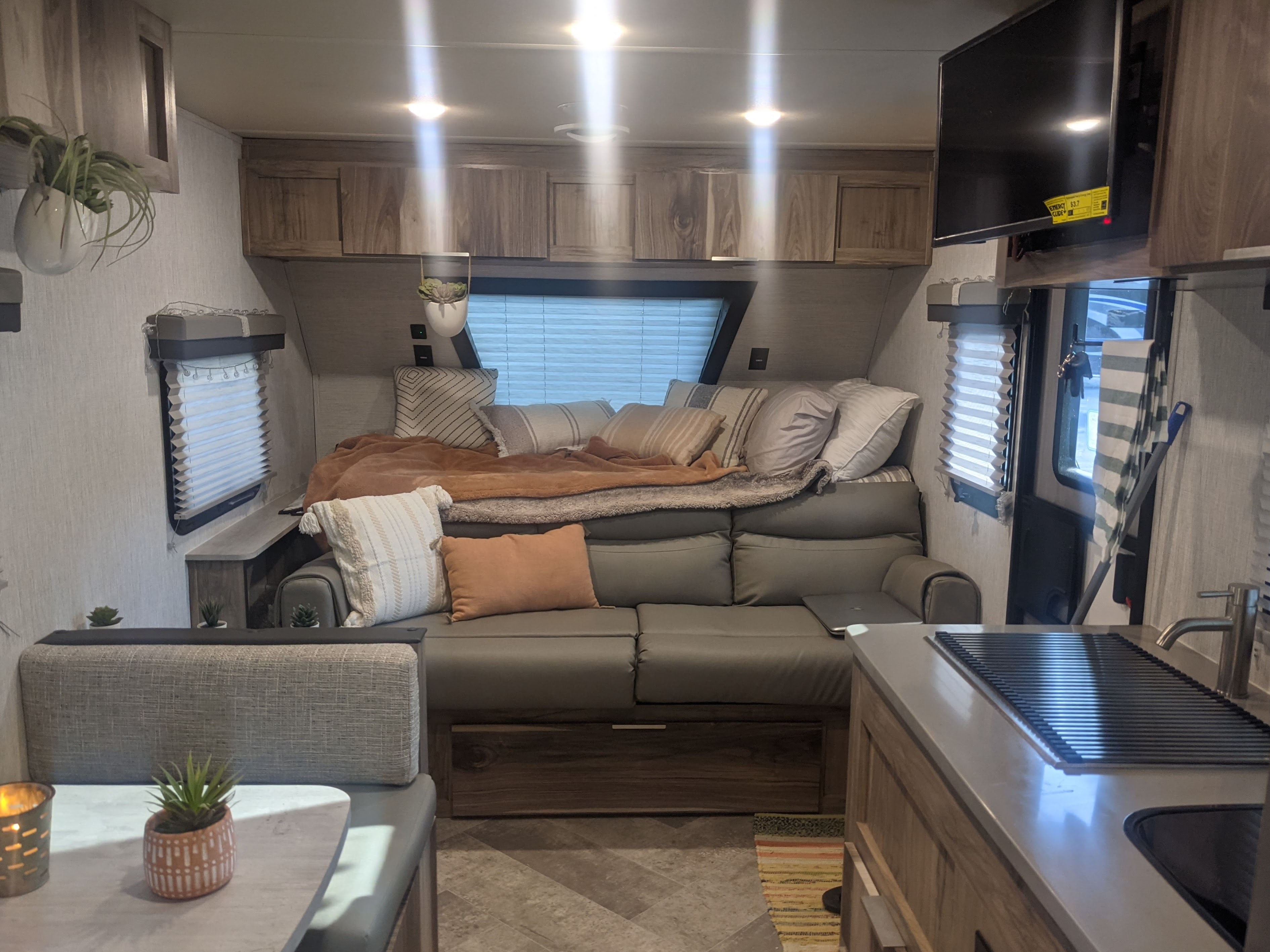 Couch folds down creating a nice cozy queen. Bring your favorite blankets and pillows to make it your home away from home. Also comes with a TV!!. Other Other 2021