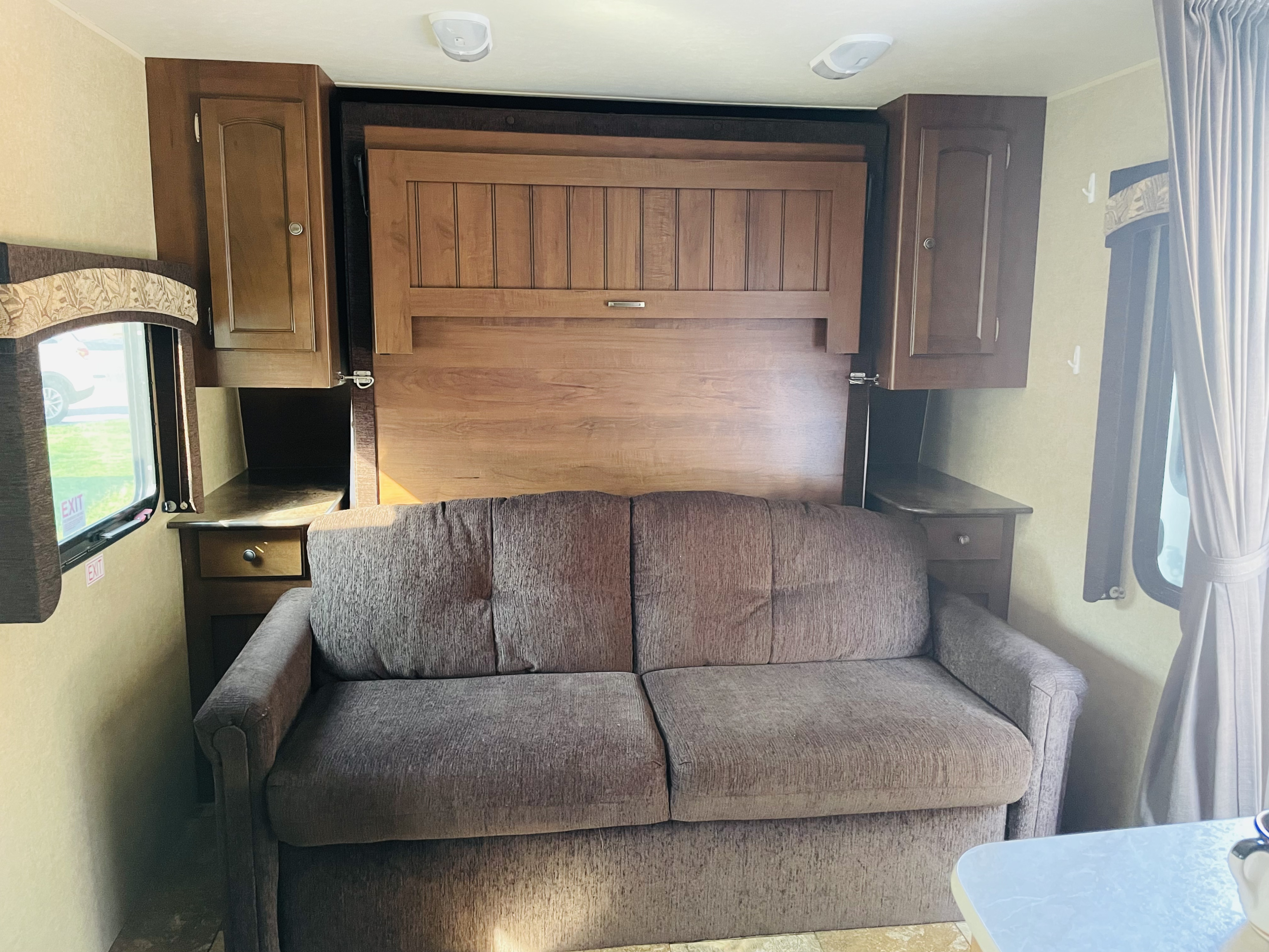 Frame folds down to release Queen bed. Jayco White Hawk Ultra Lite 2014