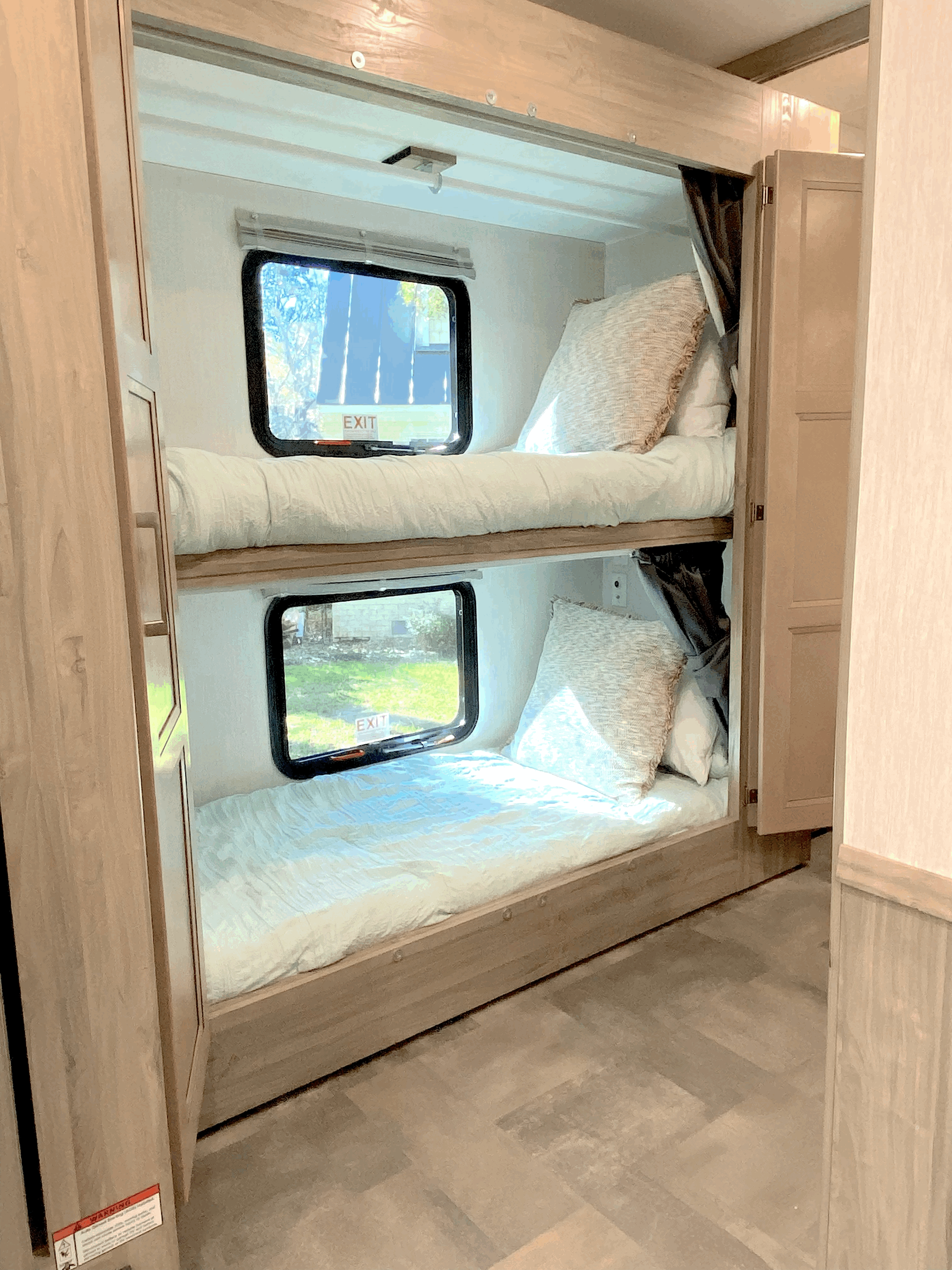 Enjoy this RV rental with cozy bunk beds, complete with windows for views and an overhead light.. Coachmen Mirada 2021