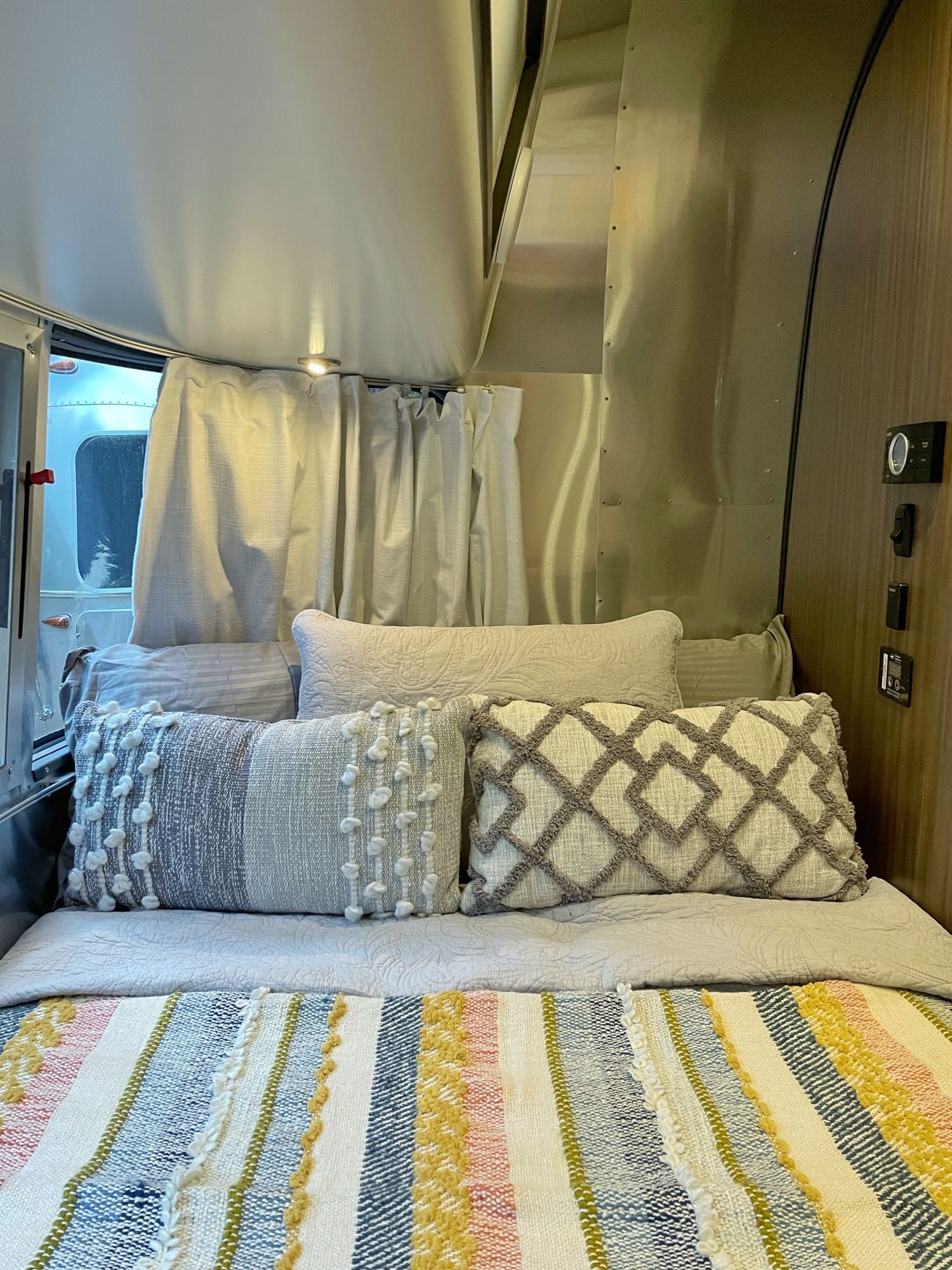 Cozy up in your full-sized bed after a day of hiking/camping!. Airstream Caravelle 2021
