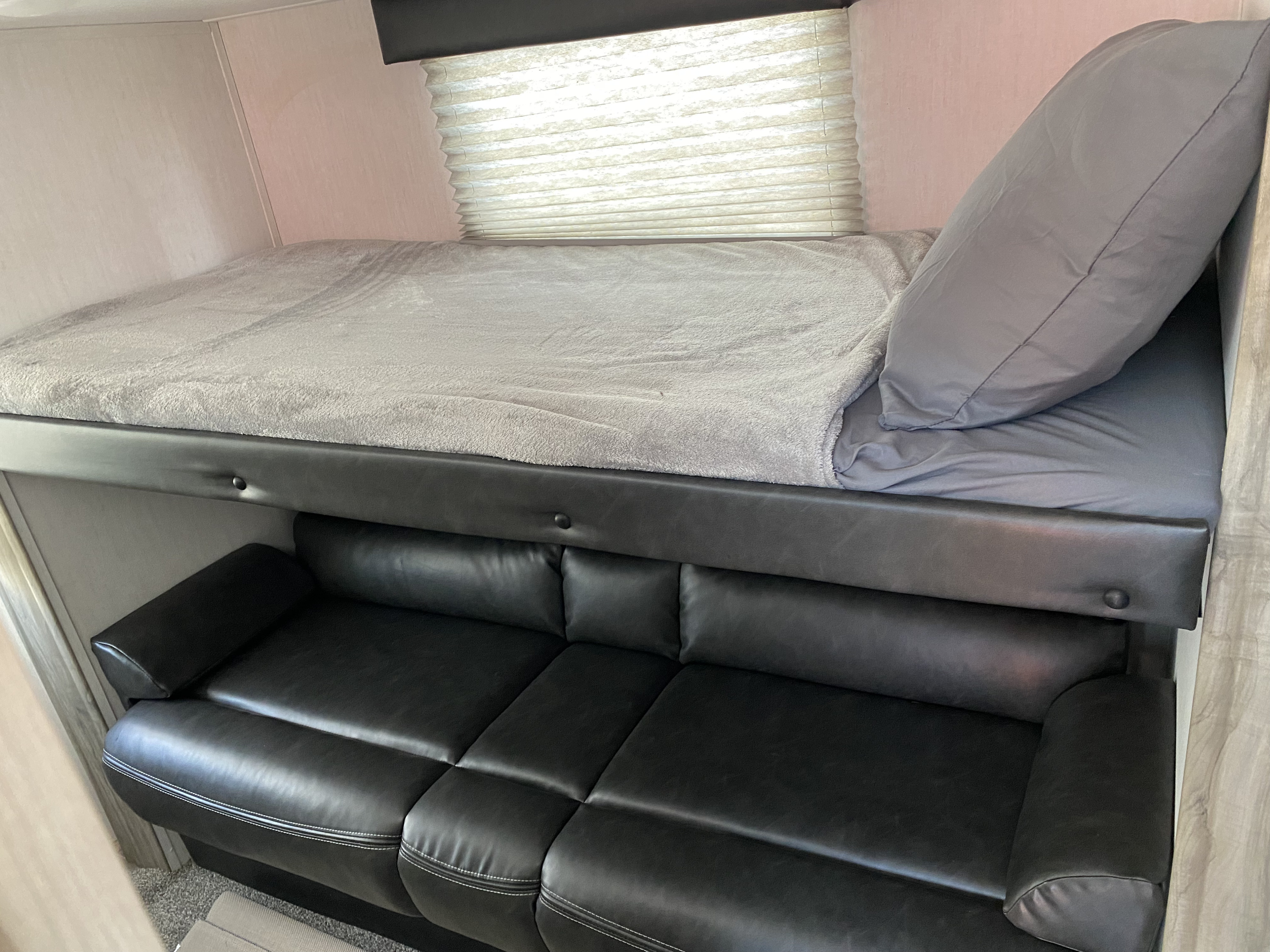 Top bunk over pull out sofa. Forest River Cherokee Alpha Wolf 2022