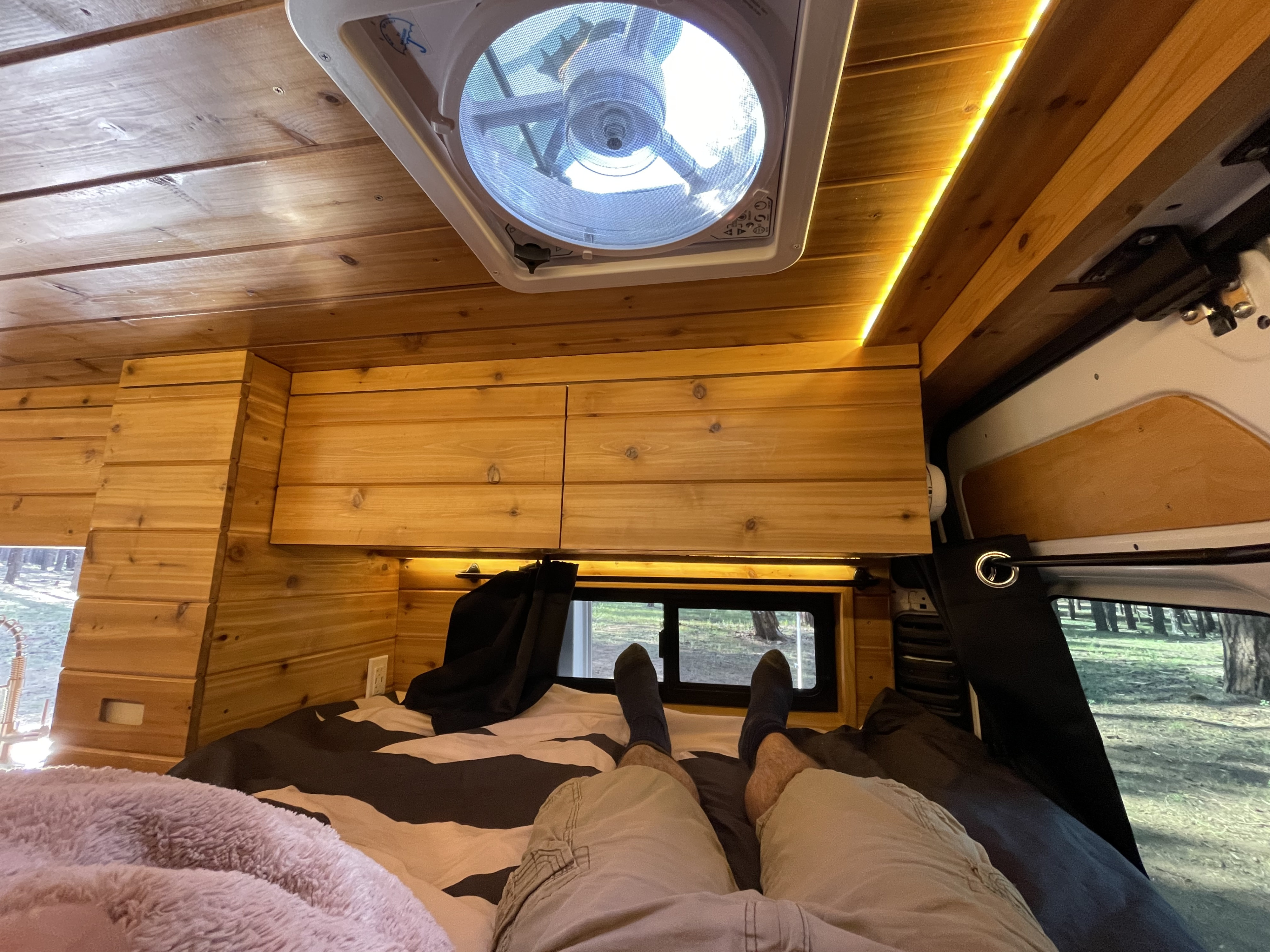 The full-sized memory foam bed comes with comfortable sheets and two memory foam pillows. Cabinets over the foot of the bed offer ample storage space.. Other Other 2021