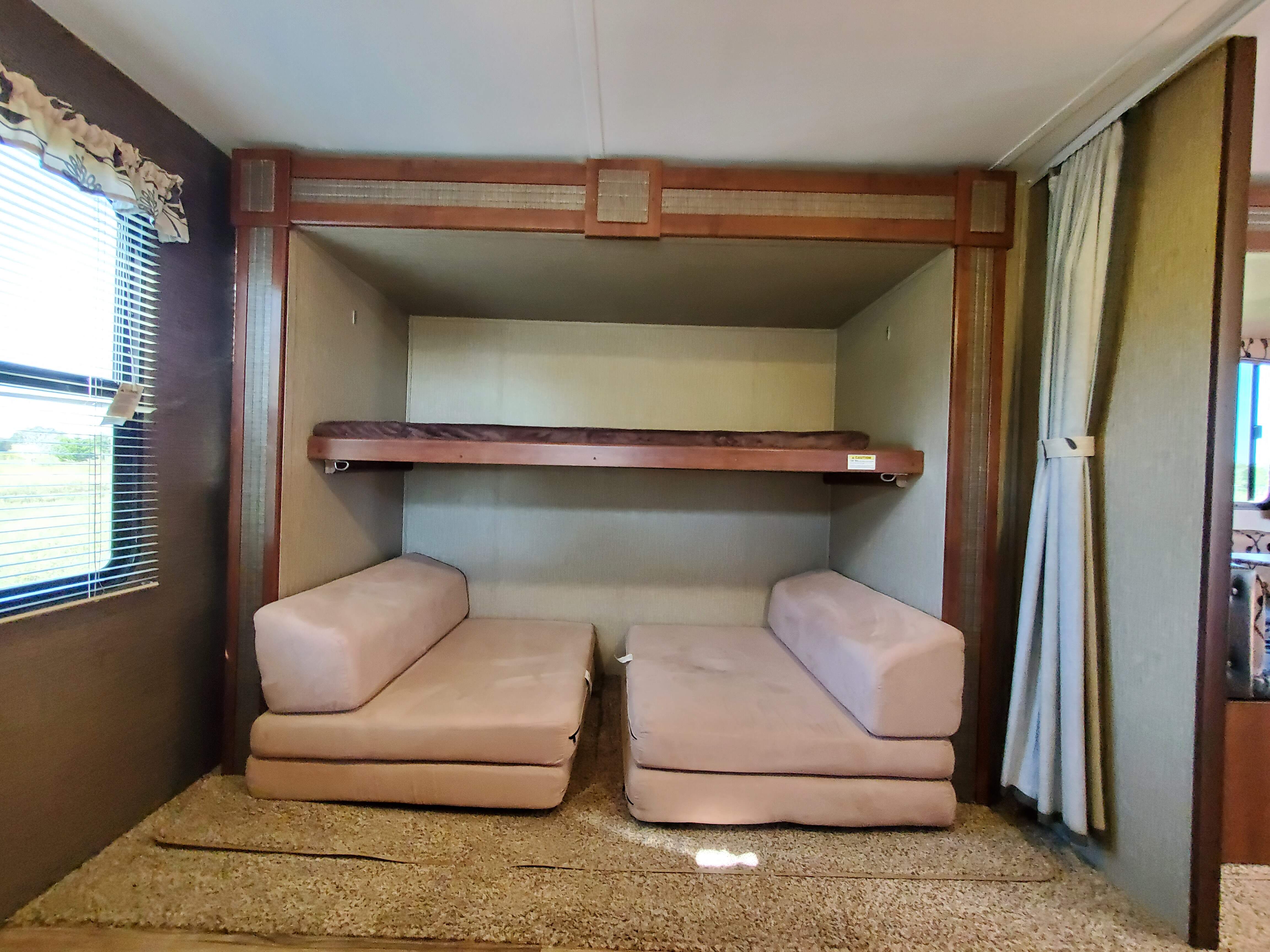 Same as previous pic but with the bunk in the sleeping position.. Keystone Passport 2017