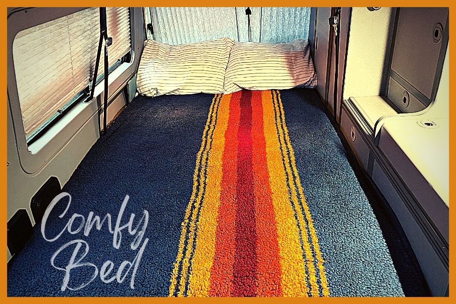 Bench seat folds down and comes with padded cover for an almost full-size 2-person bed!. Winnebago Eurovan Camper Eurovan Camper 1997